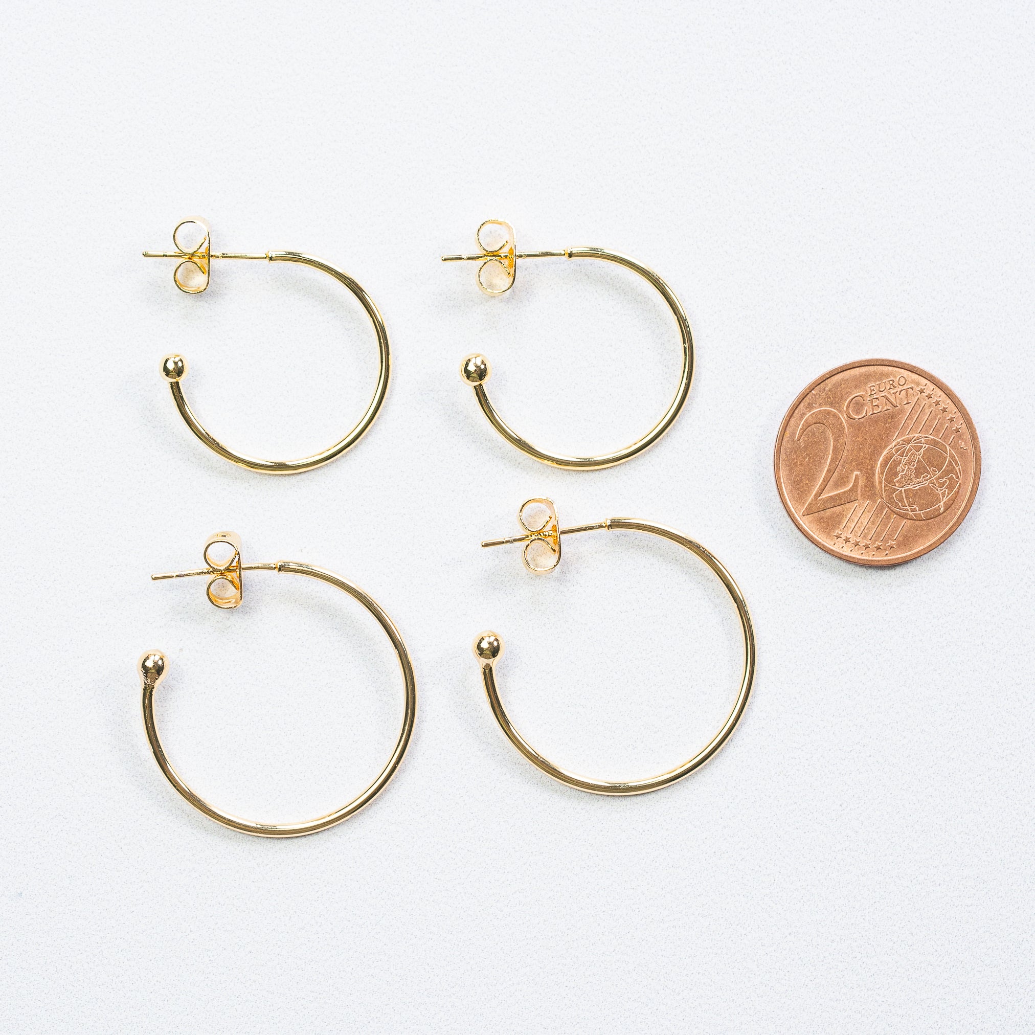 Demi-créoles en laiton plaqué or 18k er argent 925 de 20 ou 25 mm ( la paire )
