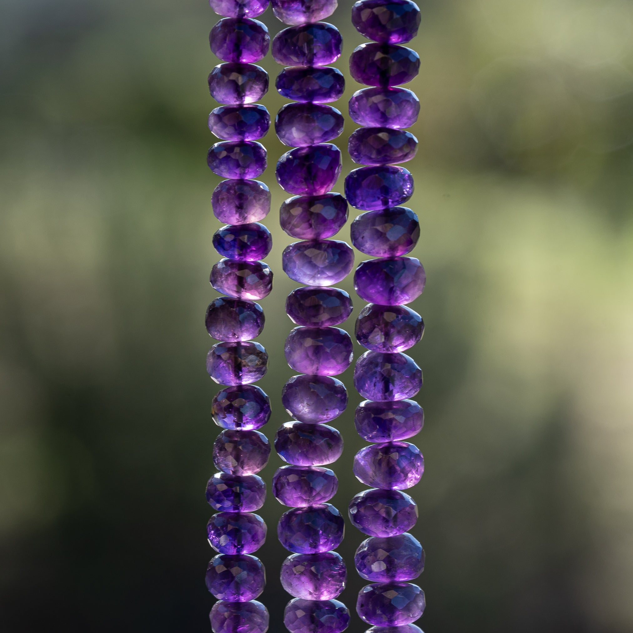 Perles rondelles facettes en Améthyste de 6,5 à 8,5 mm ( lot de 2 )