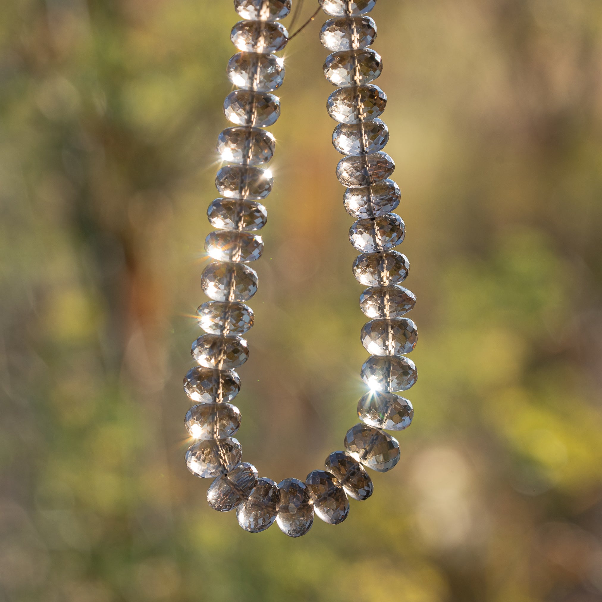 Perles rondelles facettes de quartz fumé de env 7 ou 9 mm ( lot de 2 perles )