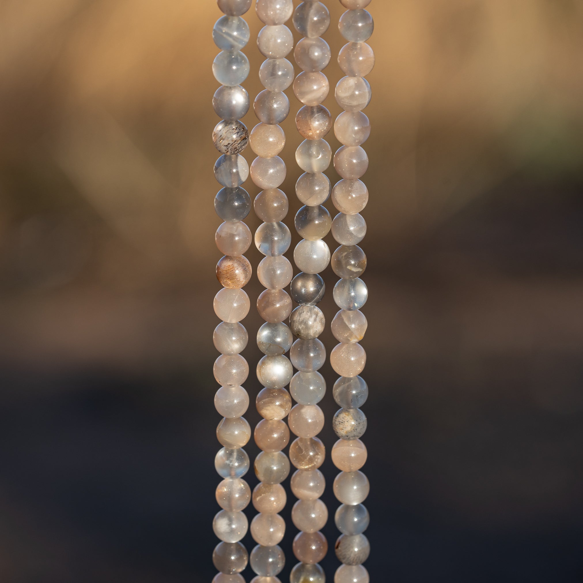 Perles rondes lisses de Pierre de lune grise de 5,7 mm ( 1/2 rang de env 33 perles )