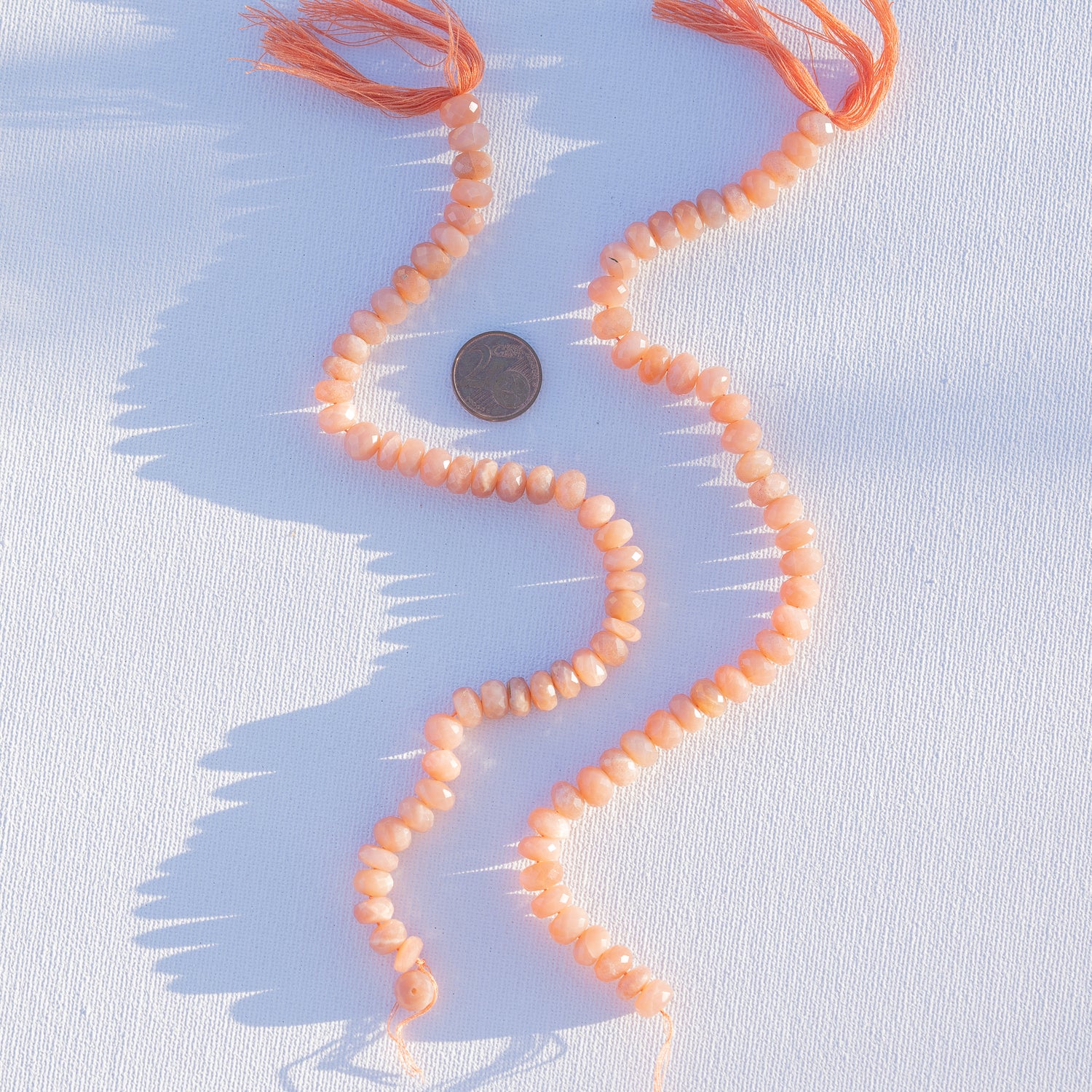 Fil de 25 cm de perles rondelles facettes de pierre de lune pêche de env 8/9 x 5/6 mm