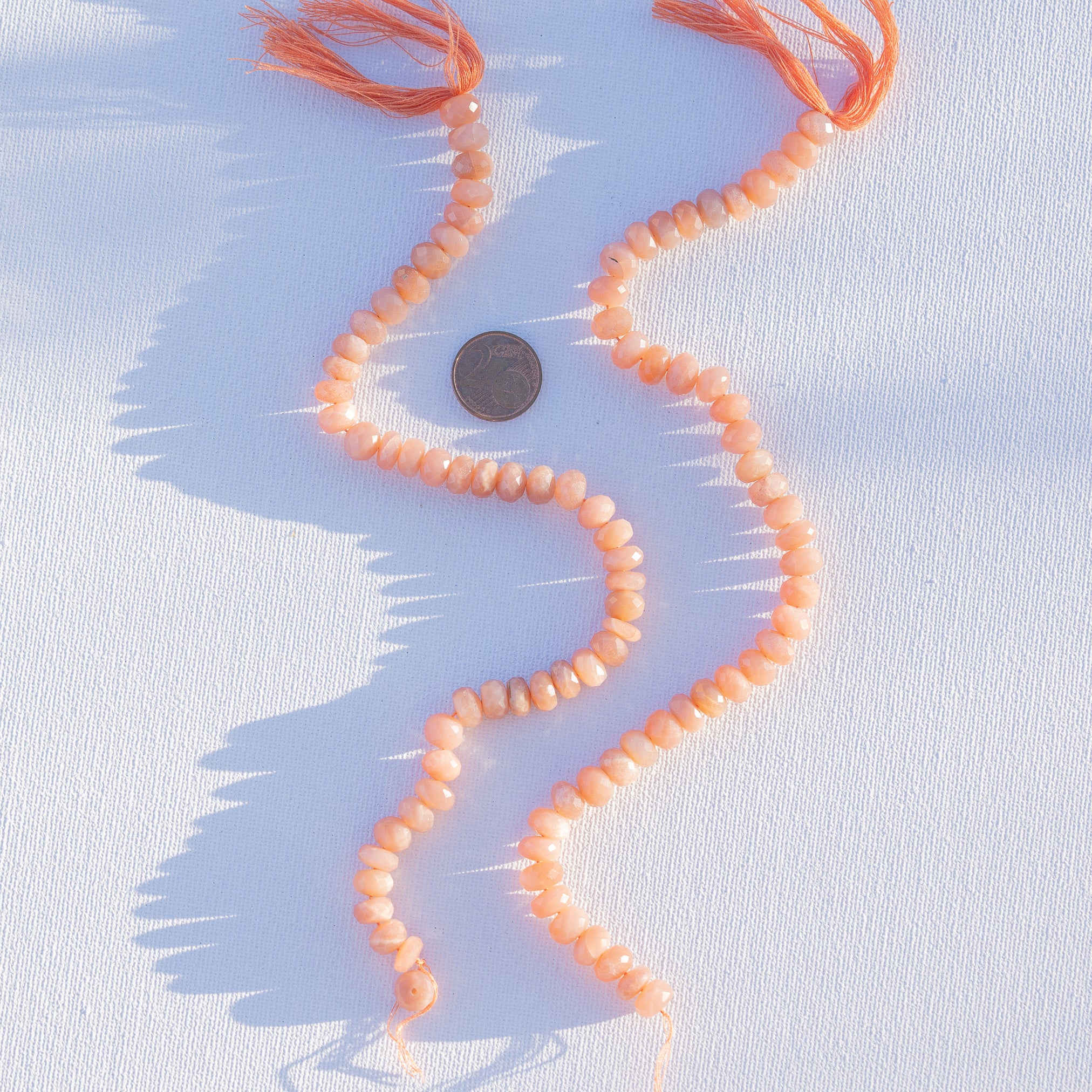 Fil de 25 cm de perles rondelles facettes de pierre de lune pêche de env 8/9 x 5/6 mm