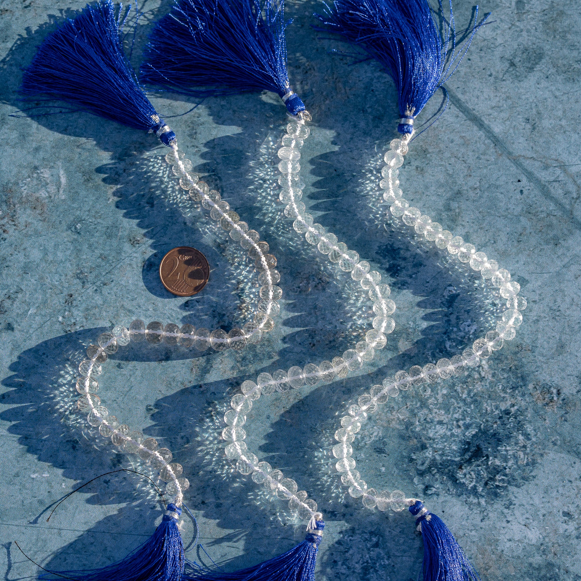 Fils de 20 cm de perles rondelles facettes de cristal de roche de env 7/8 mm