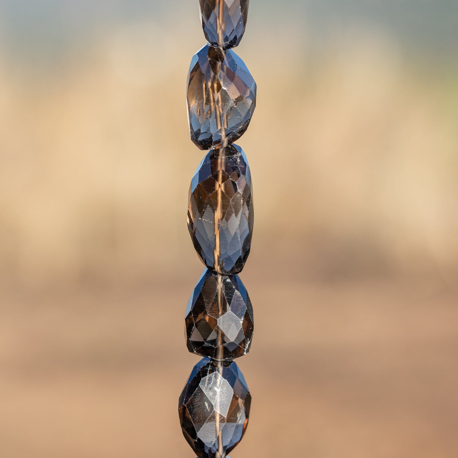 Grosses perles pépites facettes de quartz fumé de env 18 à 27 mm ( à l&