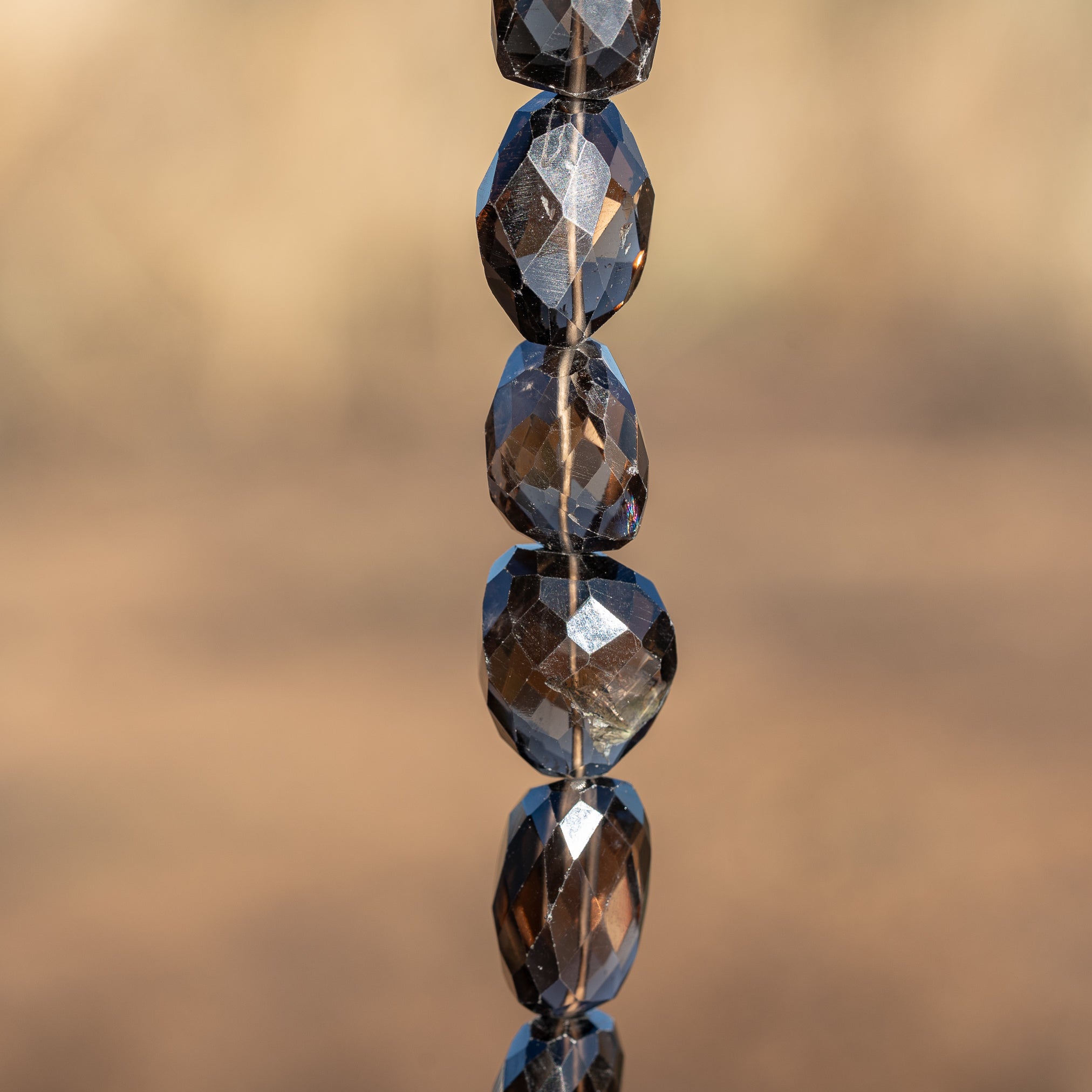 Grosses perles pépites facettes de quartz fumé de env 18 à 27 mm ( à l&