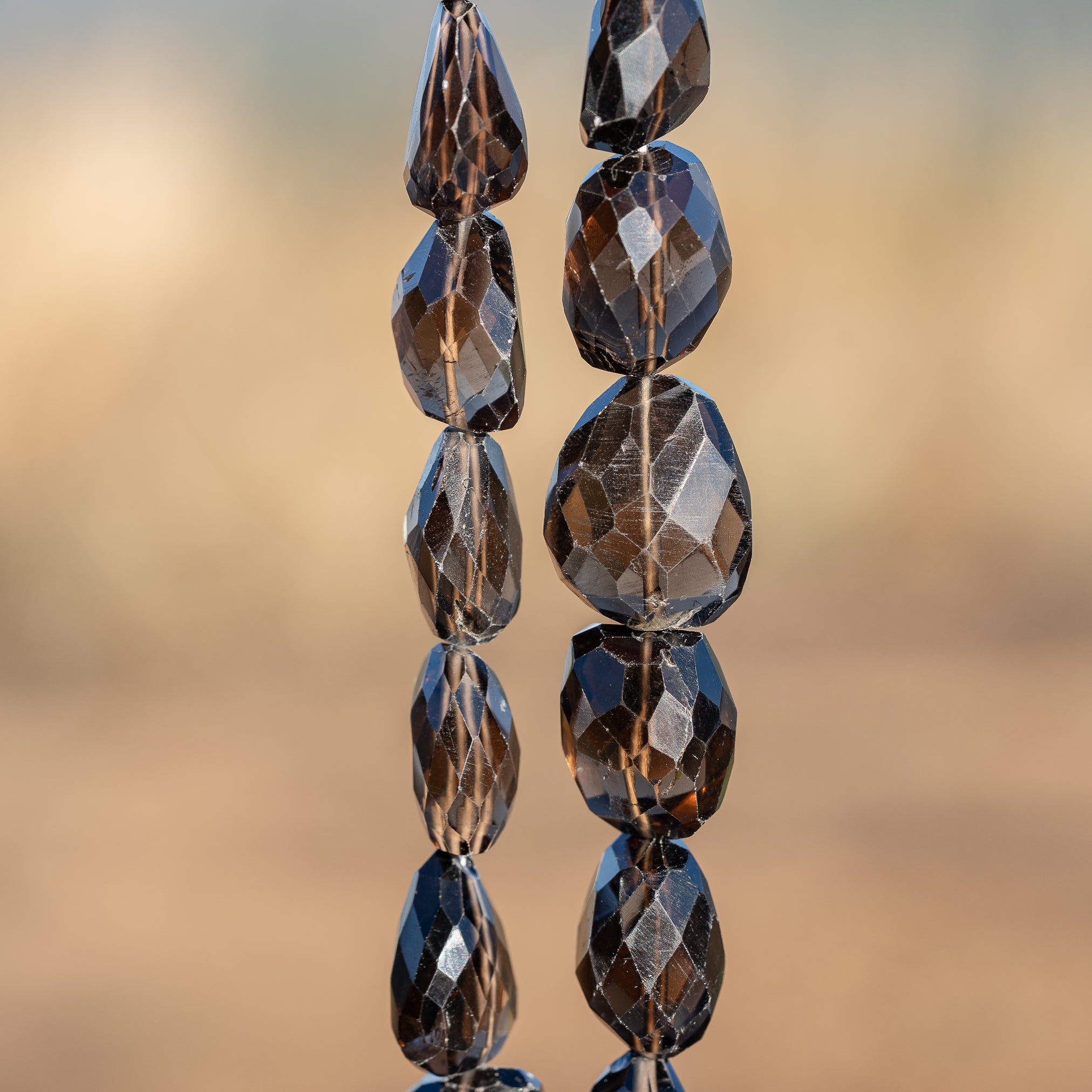 Grosses perles pépites facettes de quartz fumé de env 18 à 27 mm ( à l&