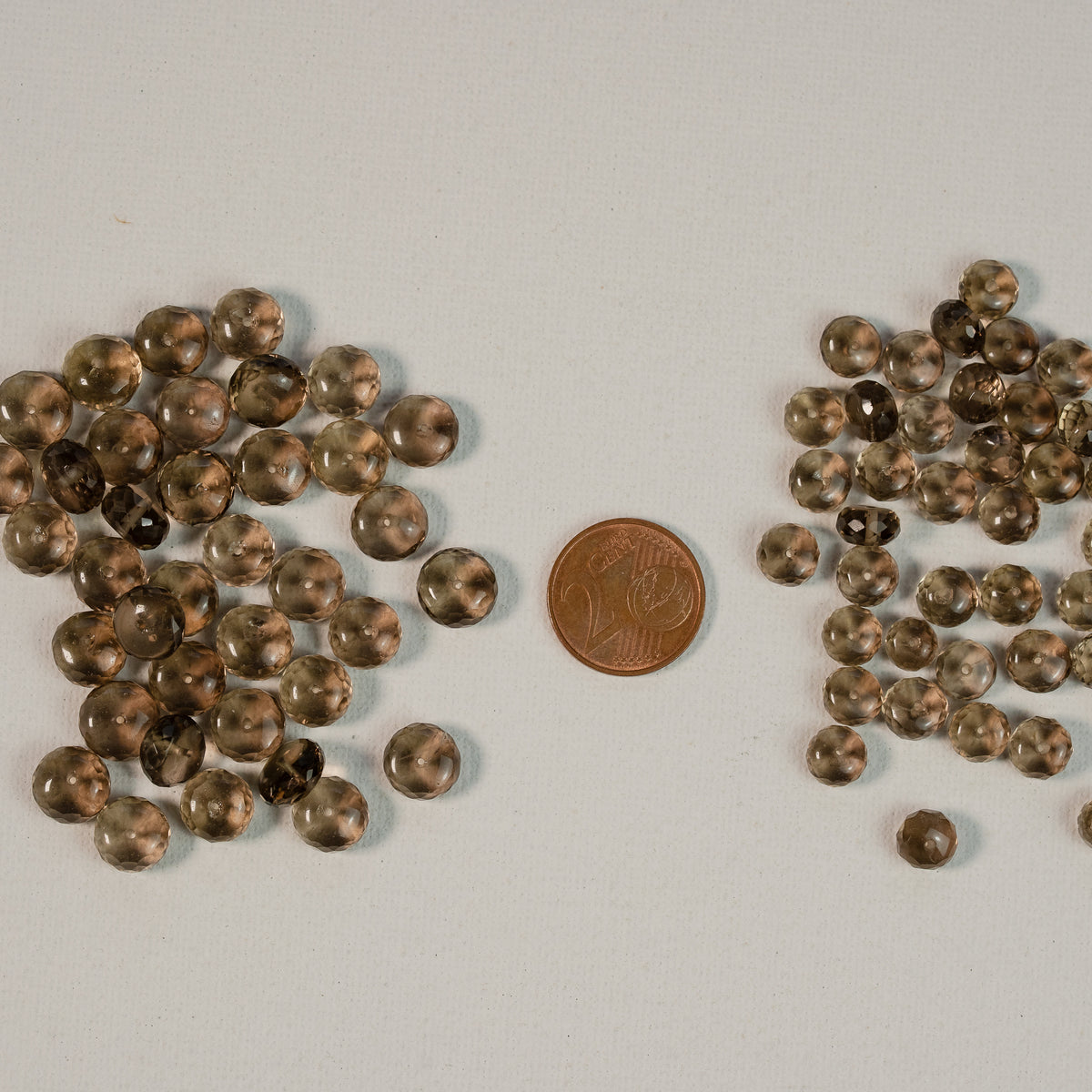 Perles rondelles facettes de quartz fumé de env 7 ou 9 mm ( lot de 2 perles )