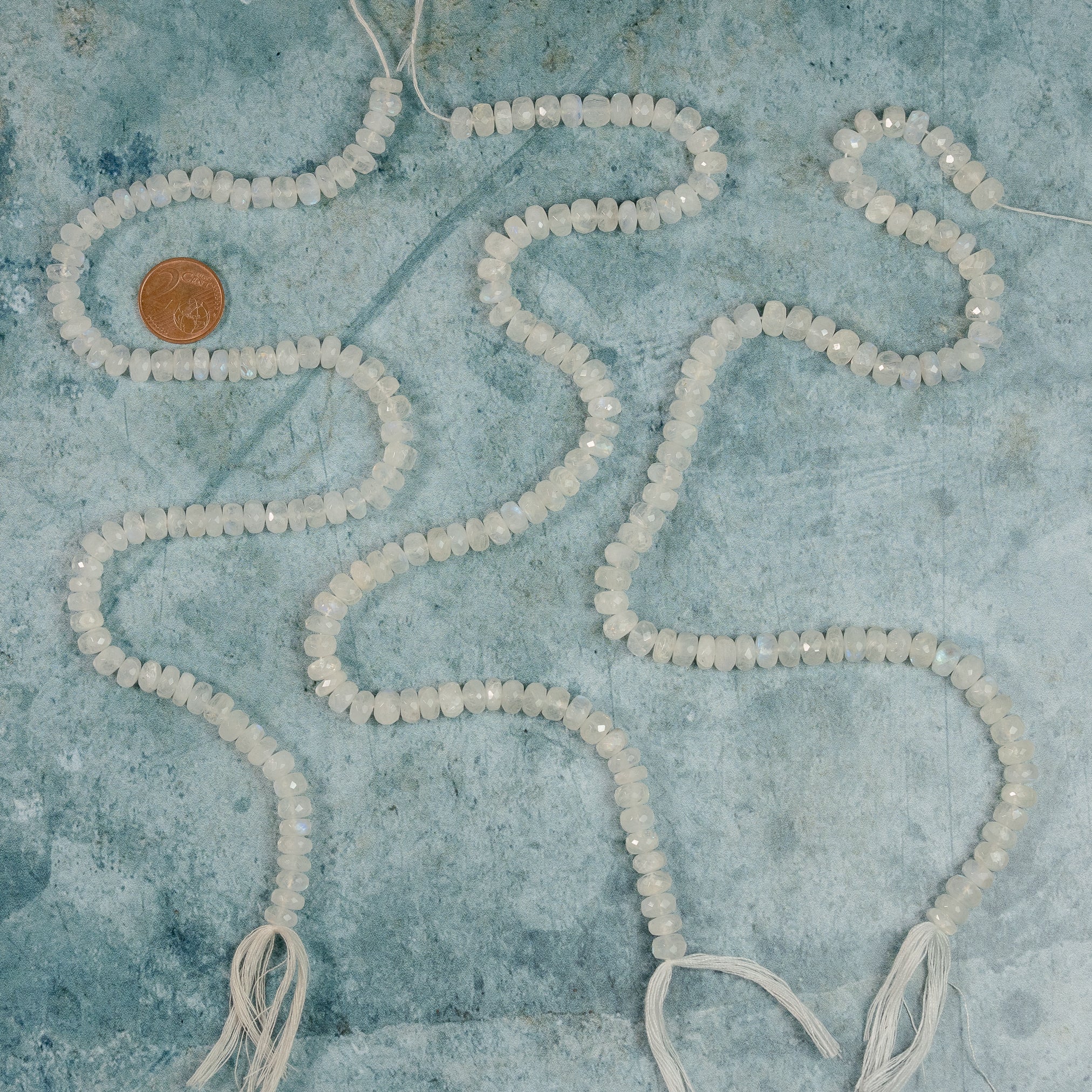 Fils de 35/36 cm de perles rondelles facettes de Labradorite blanche de 7/8 mm