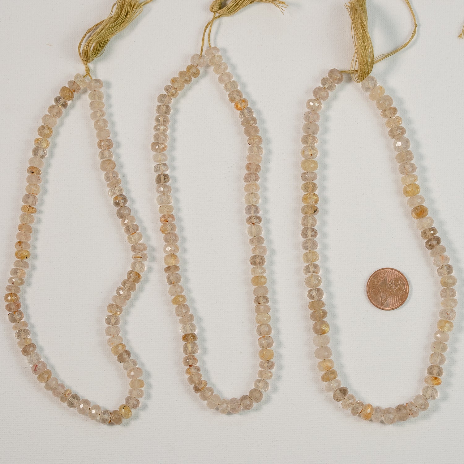 Fil de env 33 cm de perles rondelles facettes de Quartz Rutile doré de 7/8 mm