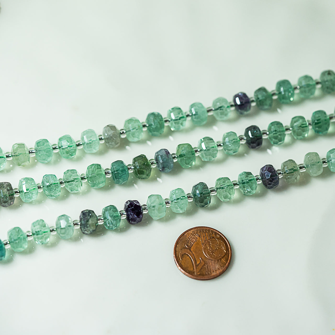 Perles rondelles facettes de Fluorite multicolore de 8 x 5 mm ( 1/2 rang de env 26 perles )