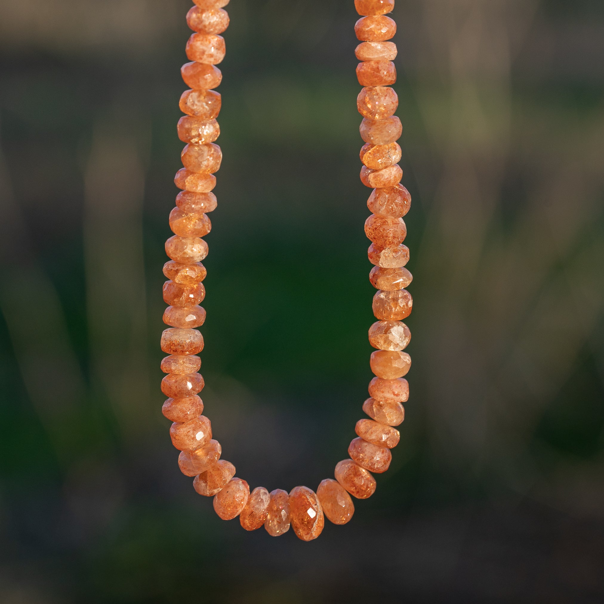 Fils de 40 cm de perles rondelles facettes de Pierre de soleil de 6 à 9 mm