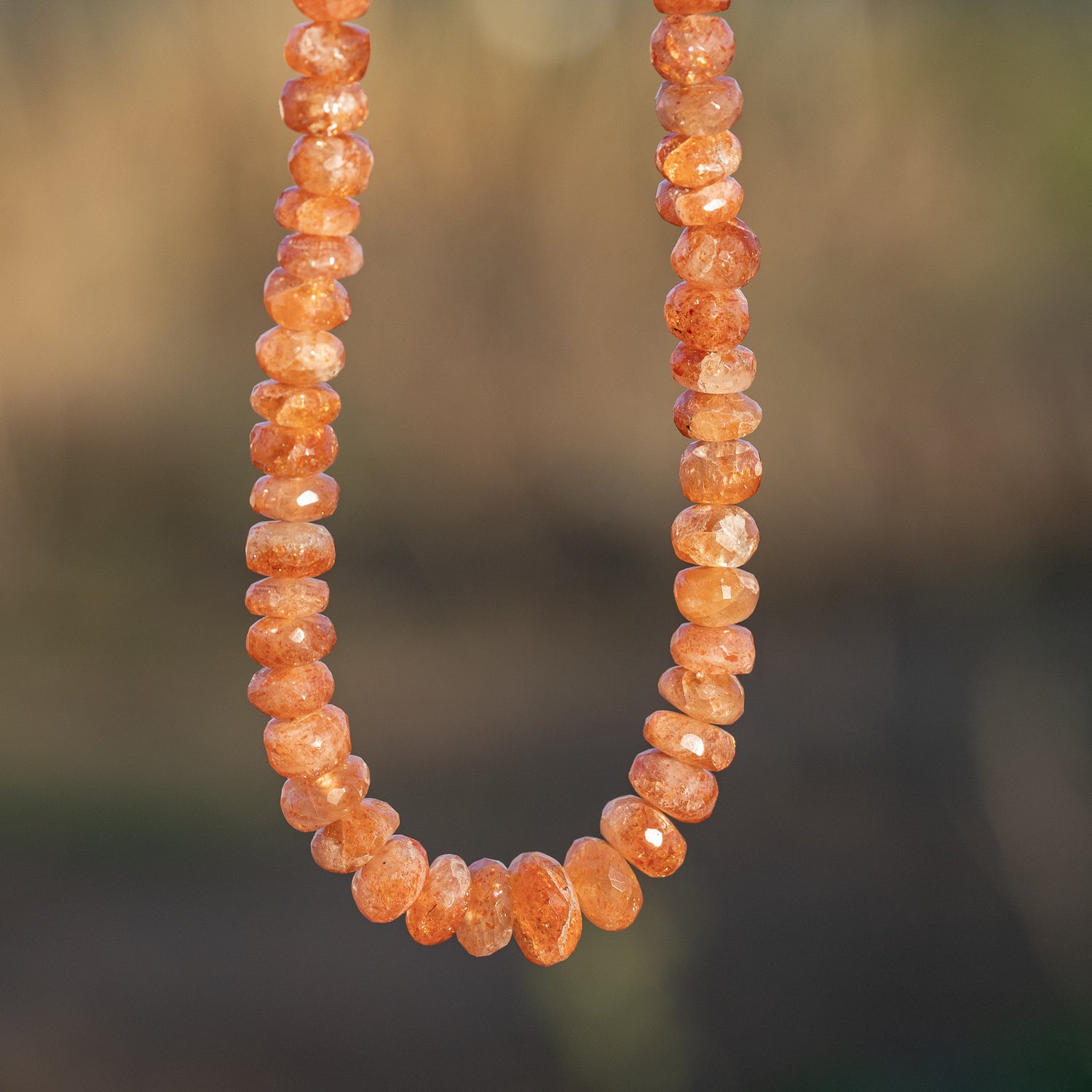 Fils de 40 cm de perles rondelles facettes de Pierre de soleil de 6 à 9 mm