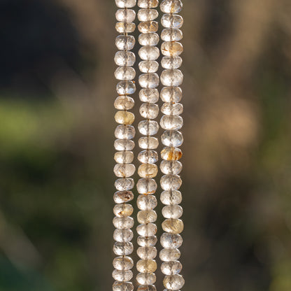 Perles rondelles facettes de Quartz Rutile doré de env 7 mm ( lot 4 perles )