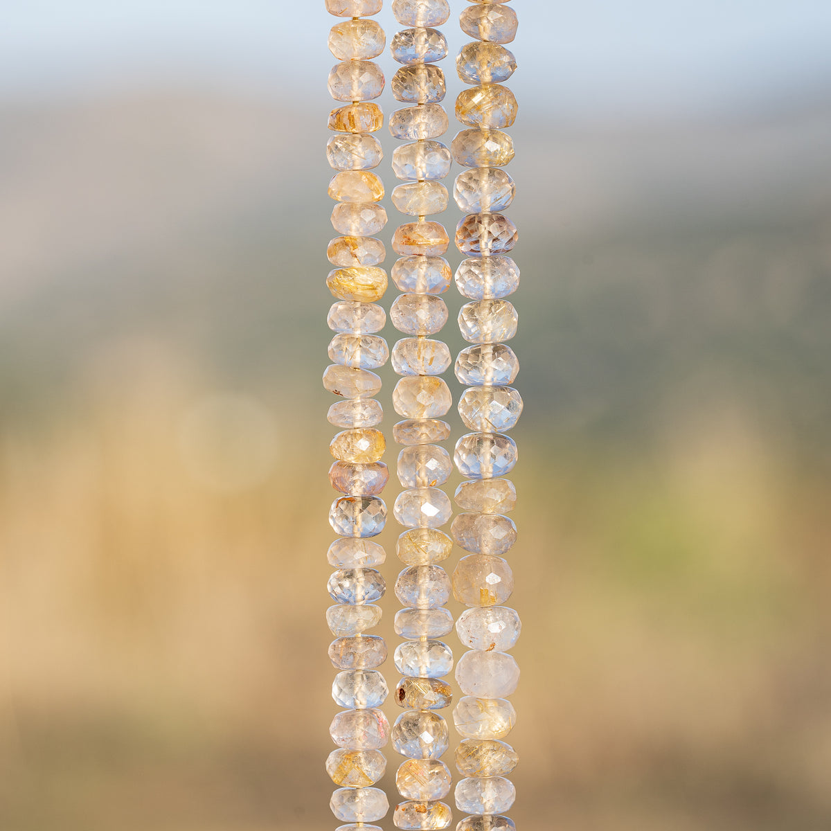 Perles rondelles facettes de Quartz Rutile doré de env 7 mm ( lot 4 perles )