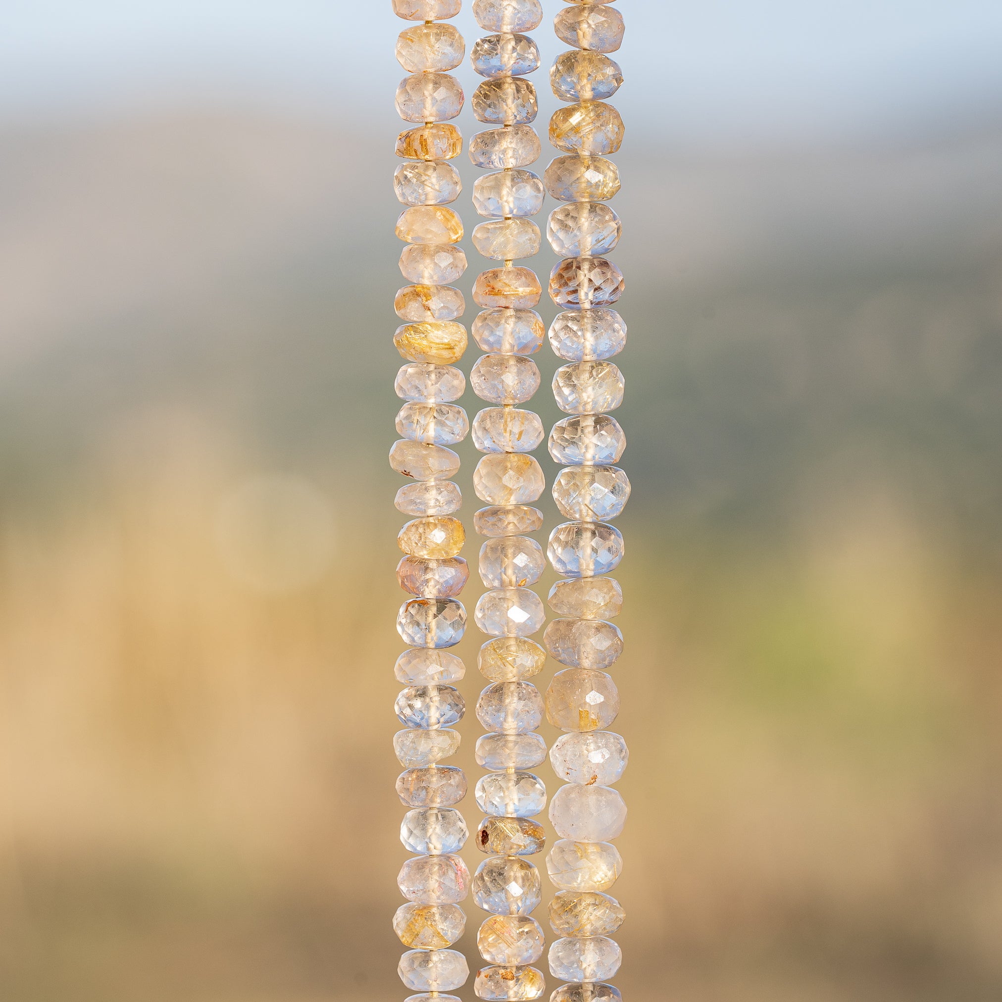 Fil de env 33 cm de perles rondelles facettes de Quartz Rutile doré de 7/8 mm