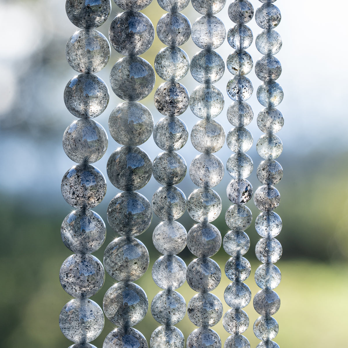 Perles rondes lisses de Quartz à Biotite de 6 ou 10 mm ( Rang ou 1/2 rang )