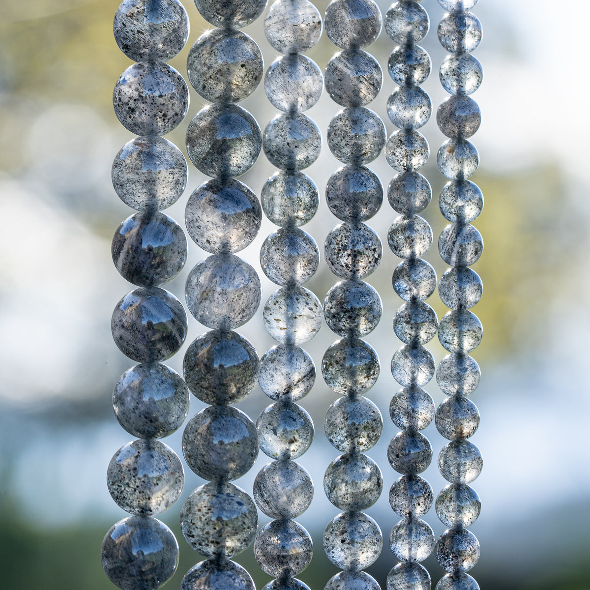 Perles rondes lisses de Quartz à Biotite de 6 ou 10 mm ( Rang ou 1/2 rang )