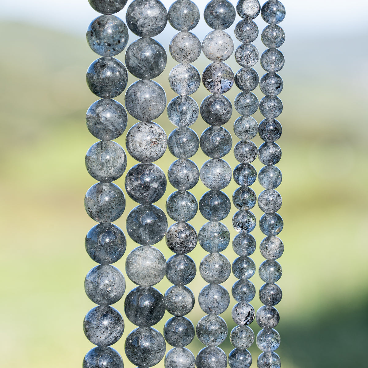 Perles rondes lisses de Quartz à Biotite de 6 ou 10 mm ( Rang ou 1/2 rang )