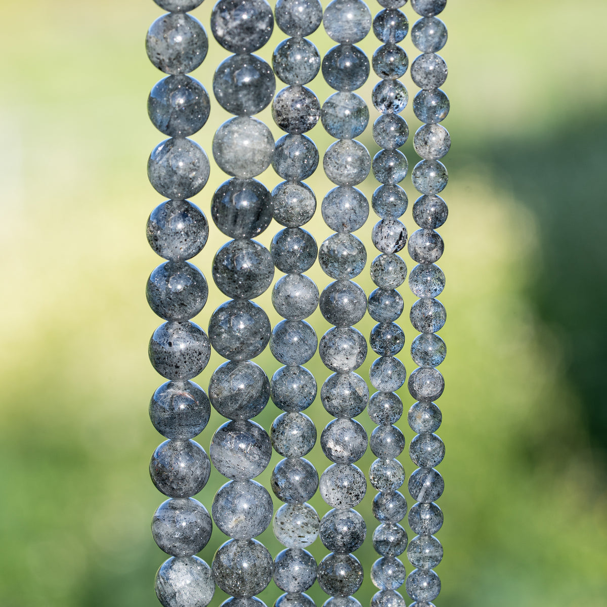 Perles rondes lisses de Quartz à Biotite de 6 ou 10 mm ( Rang ou 1/2 rang )