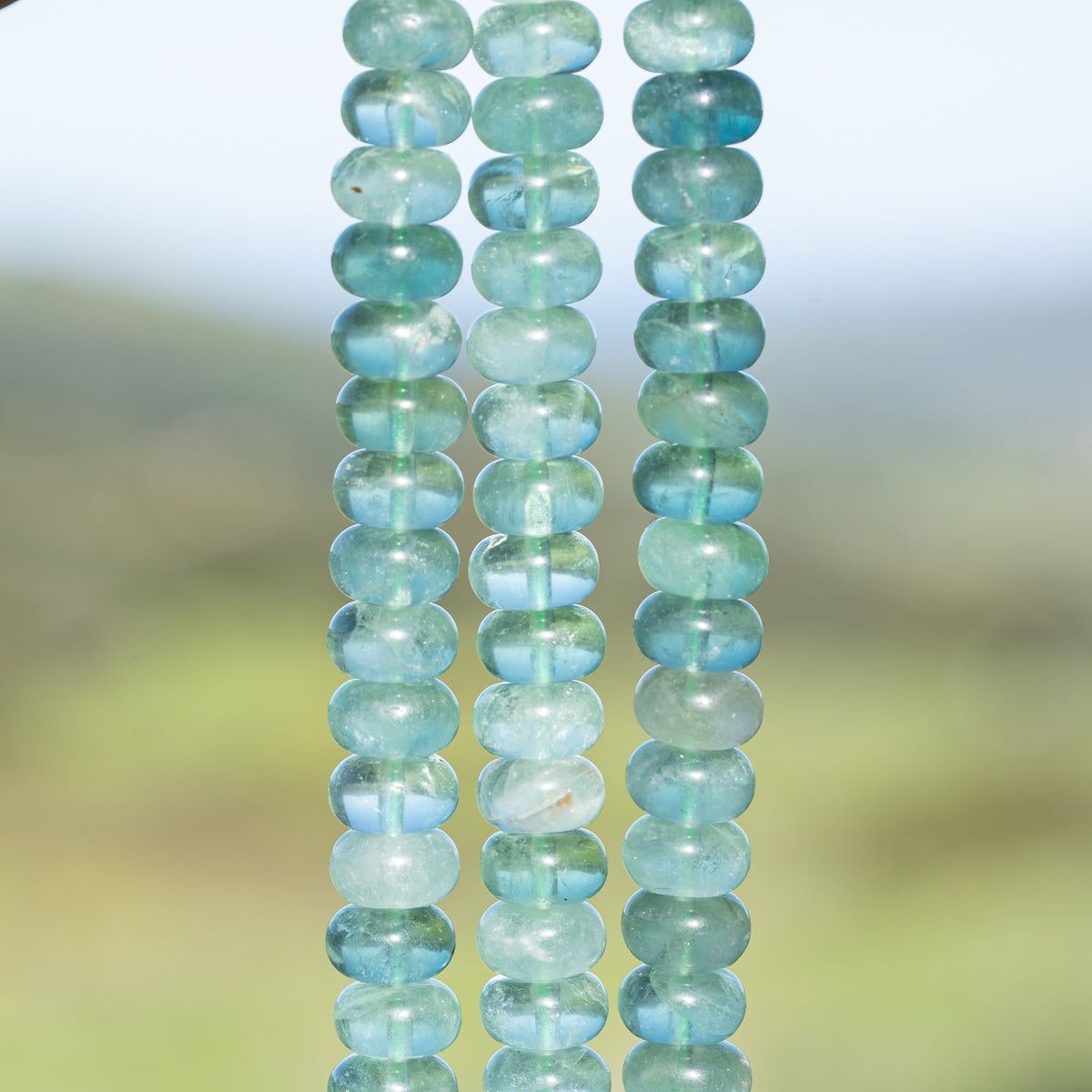 Perles rondelles lisses de Fluorite verte/bleue de env 10 x 6 mm ( lot de 10 )