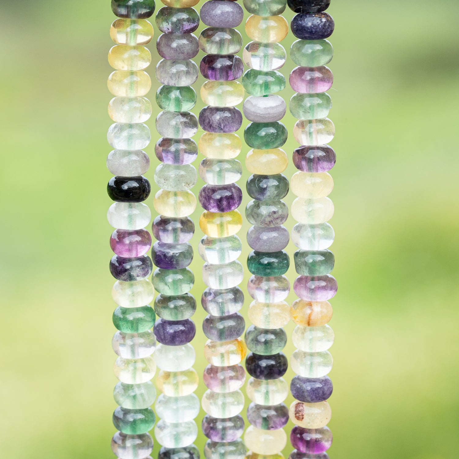 Perles rondelles lisses de Fluorite multicolore de 7,5 x 5 mm ( 1/2 rang de env 42 perles )