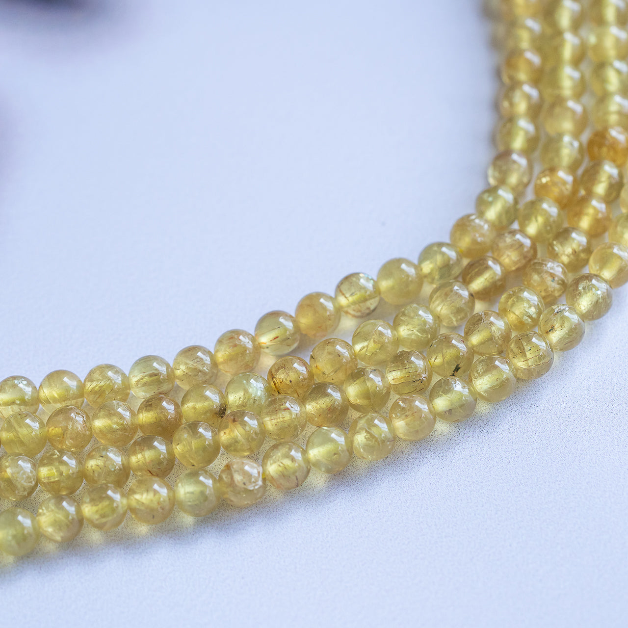 Perles rondes en Apatite jaune de 5,5 mm ( lot de 10 )