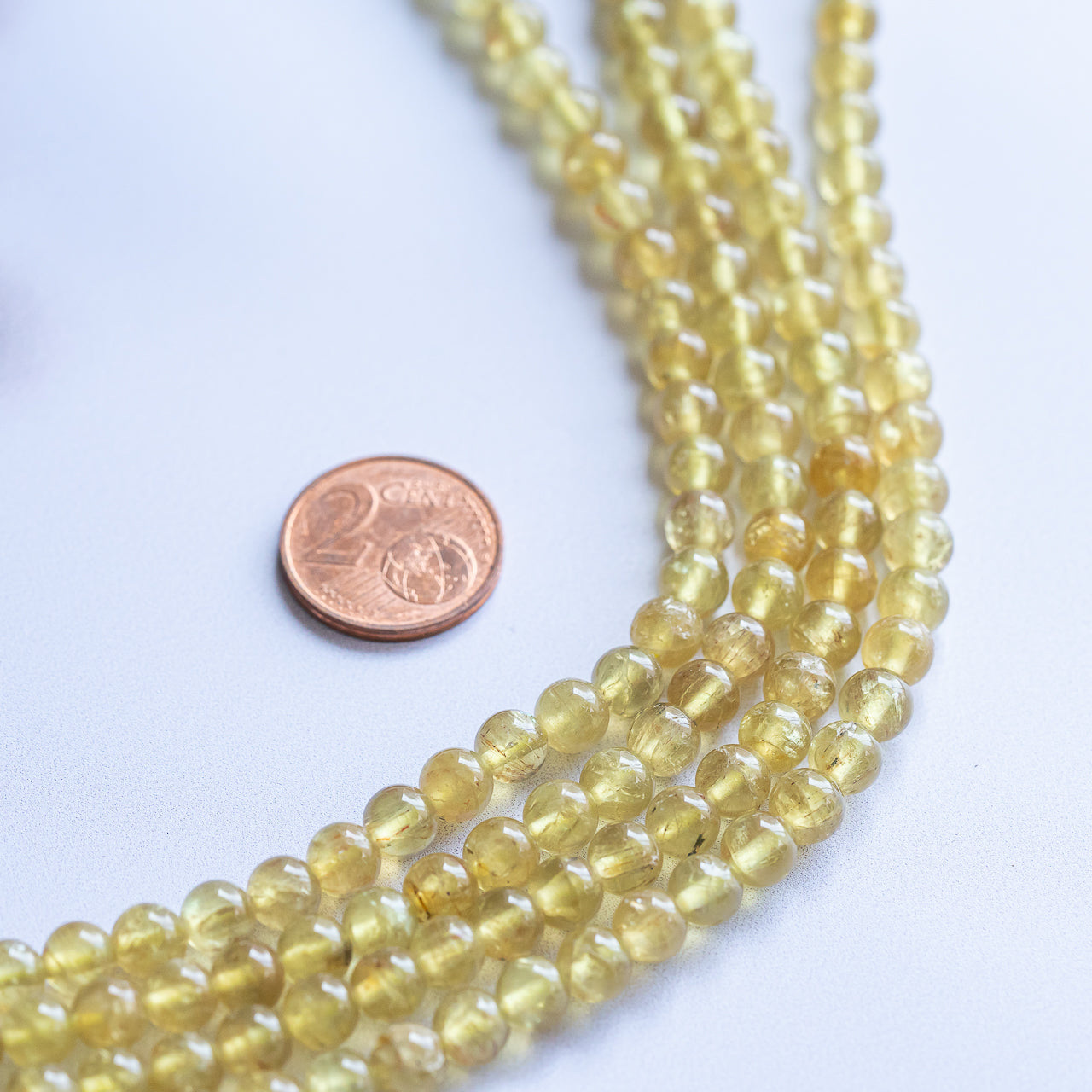 Perles rondes en Apatite jaune de 5,5 mm ( lot de 10 )