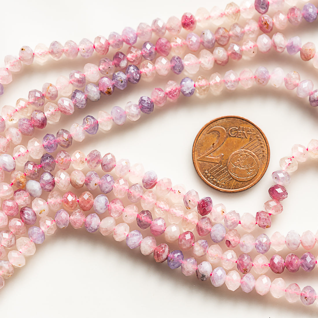 Perles rondelles facettes de Tourmaline rose de 5 x 3,5 mm ( rang de env 105 perles )