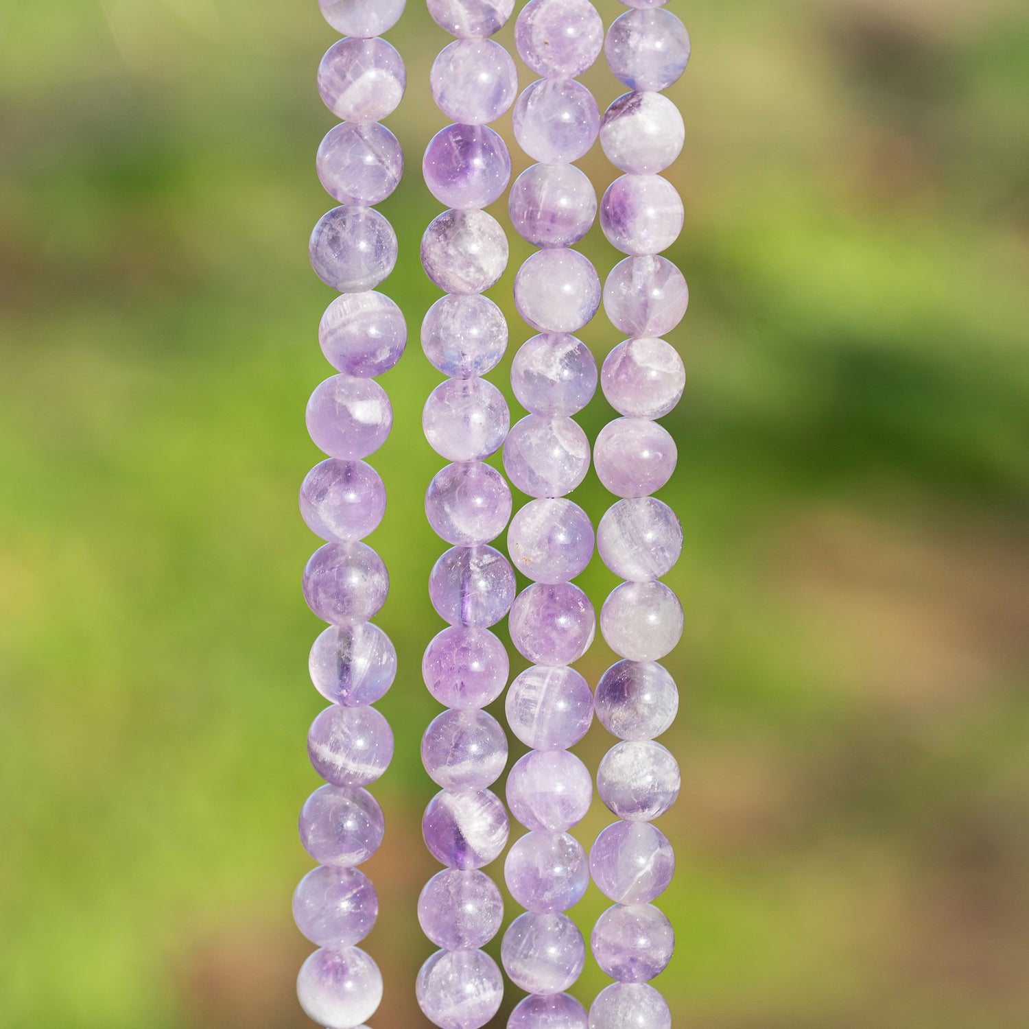 Perles rondes lisses en Améthyste lilas de 8 mm ( rang de env 48 perles )