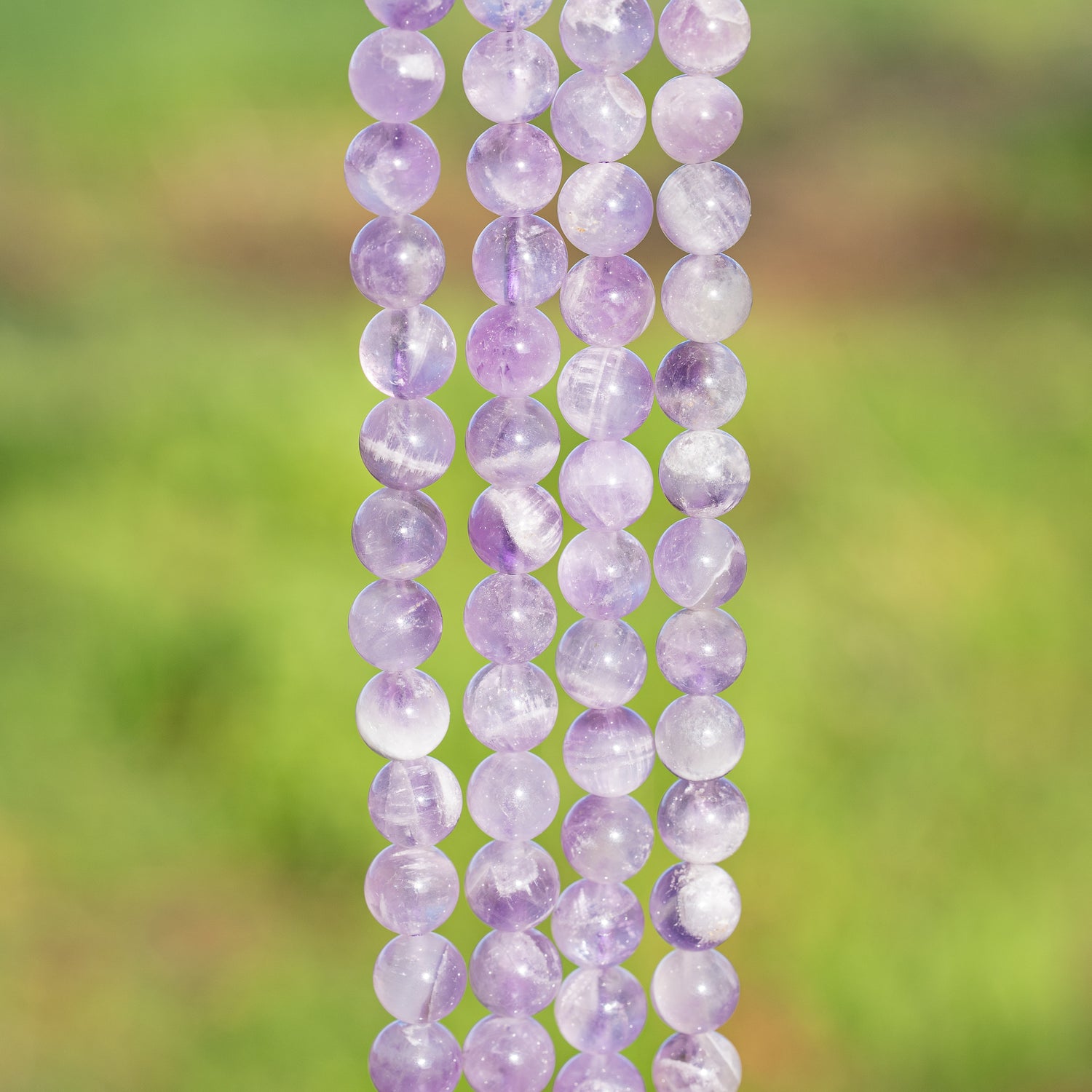 Perles rondes lisses en Améthyste lilas de 8 mm ( rang de env 48 perles )