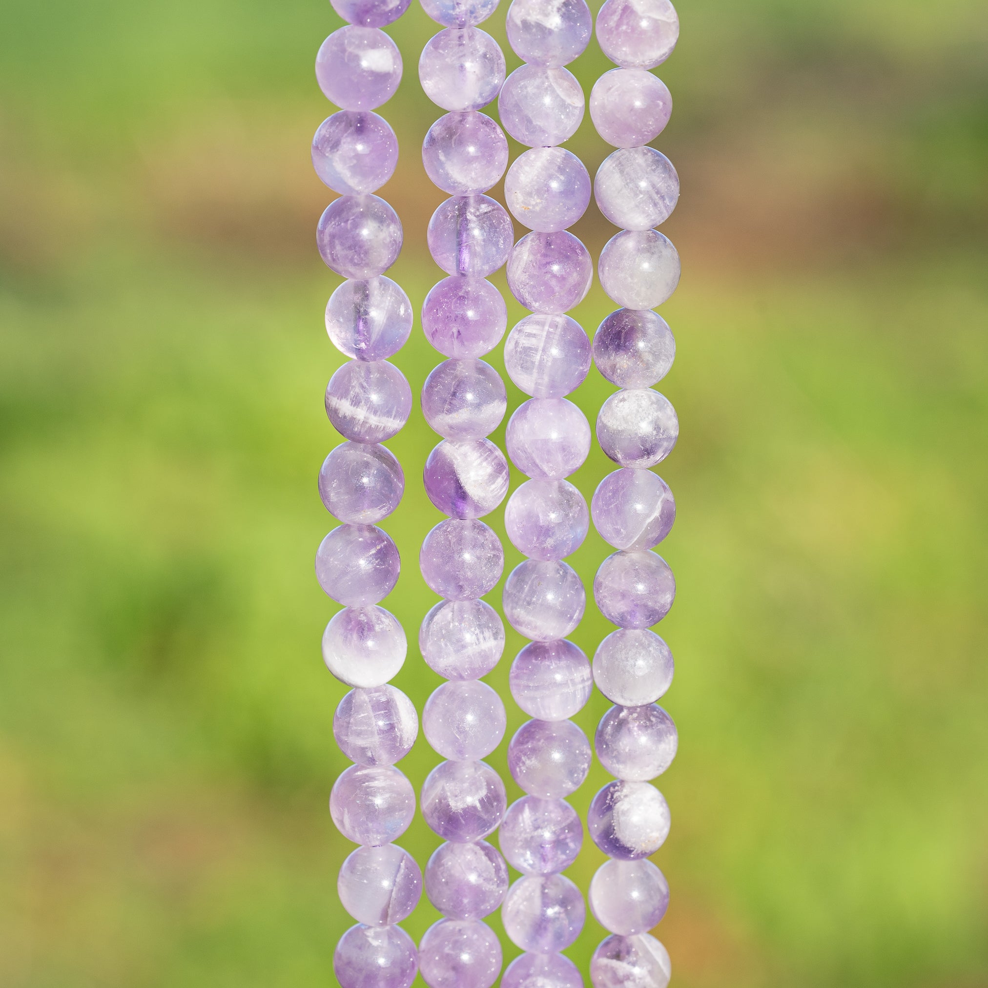 Perles rondes lisses en Améthyste lilas de 8 mm ( rang de env 48 perles )