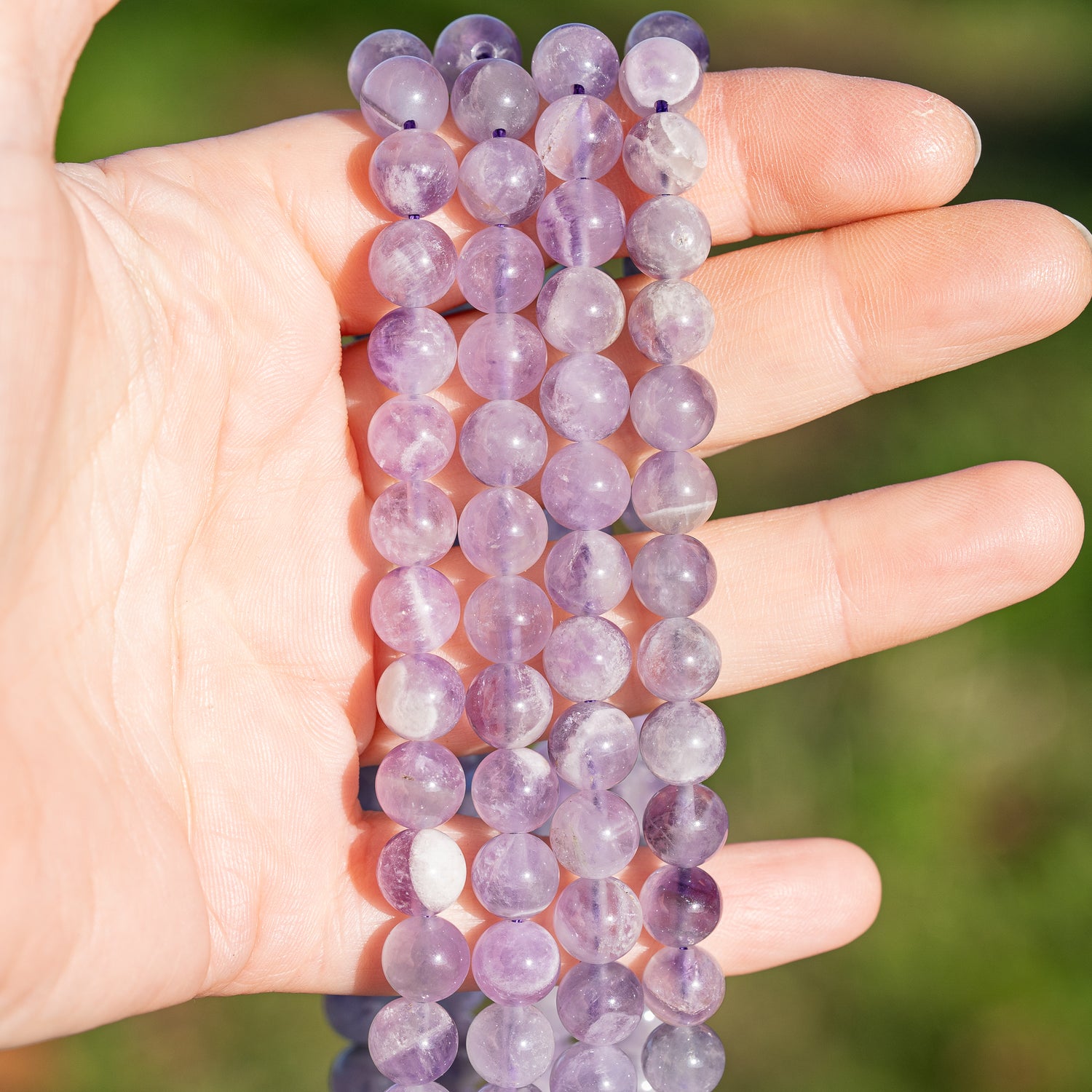 Perles rondes lisses en Améthyste lilas de 8 mm ( rang de env 48 perles )