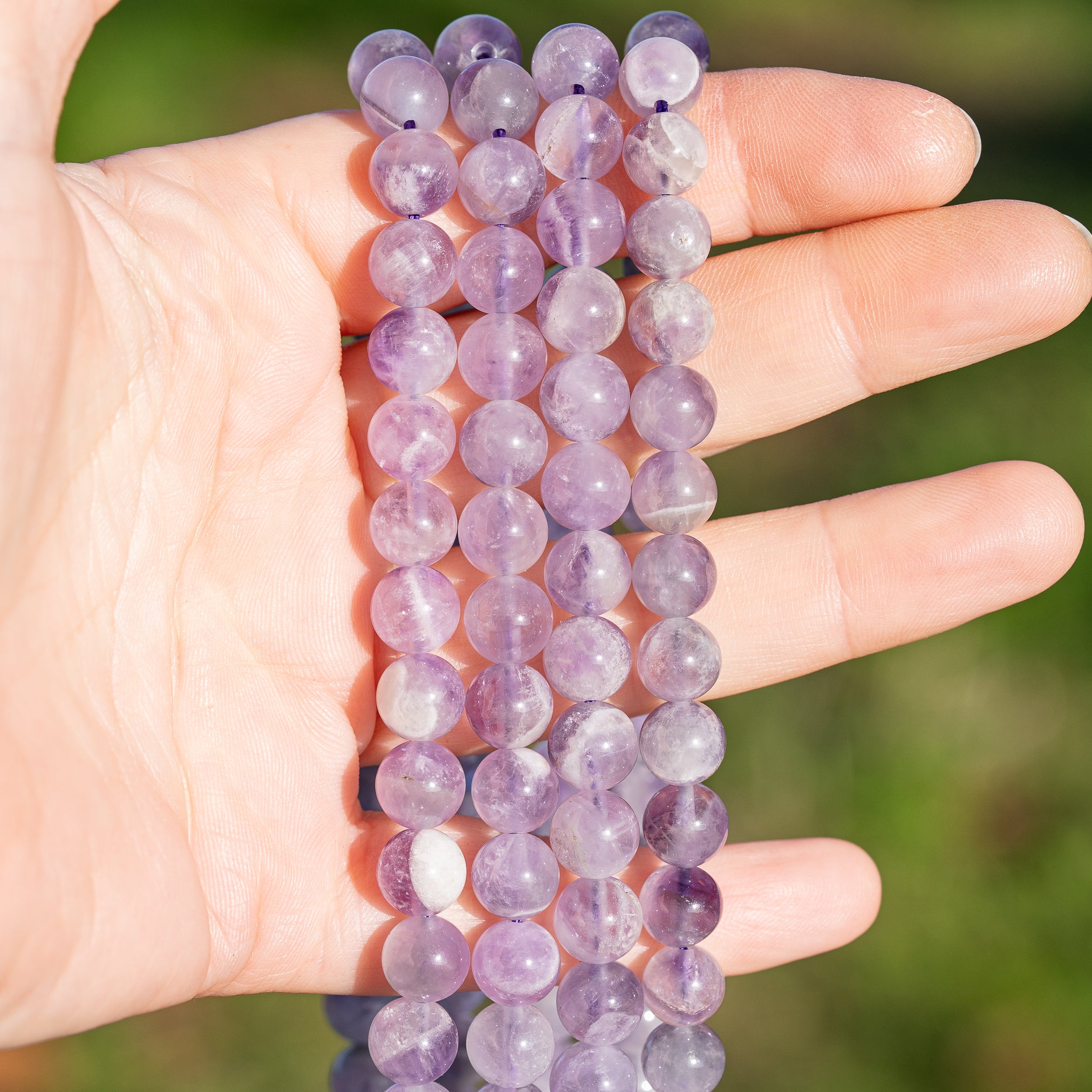 Perles rondes lisses en Améthyste lilas de 8 mm ( rang de env 48 perles )