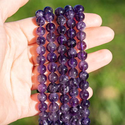 Perles rondes lisses en Améthyste de 8,5 mm ( rang de env 46 perles )