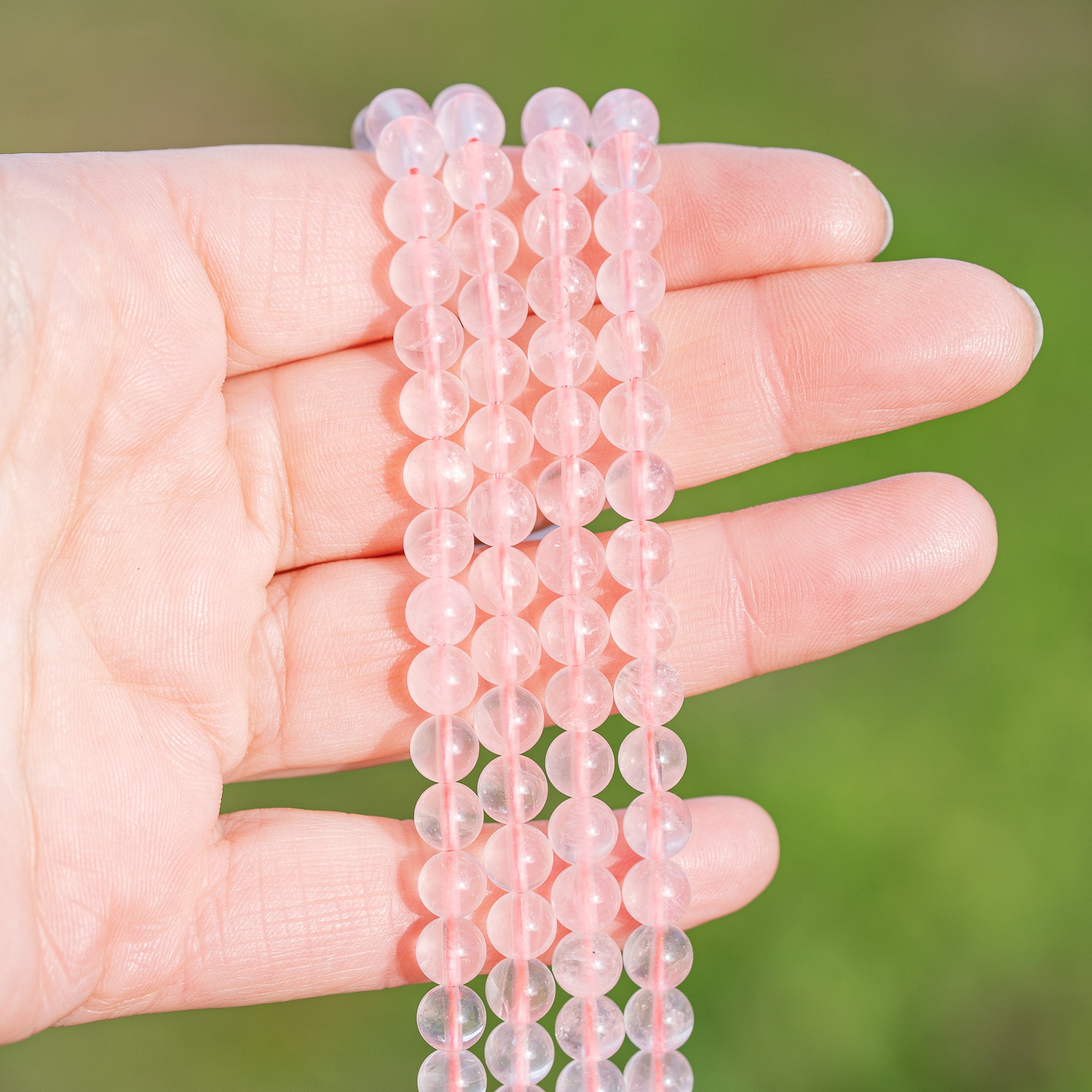 Perles rondes lisses de Quartz rose de 6,5 mm ( 1/2 rang de env 29 perles )