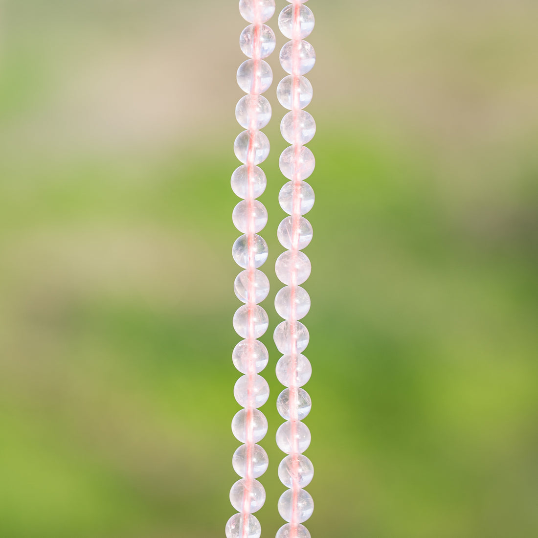 Perles rondes lisses de Quartz rose de 6,5 mm ( 1/2 rang de env 29 perles )