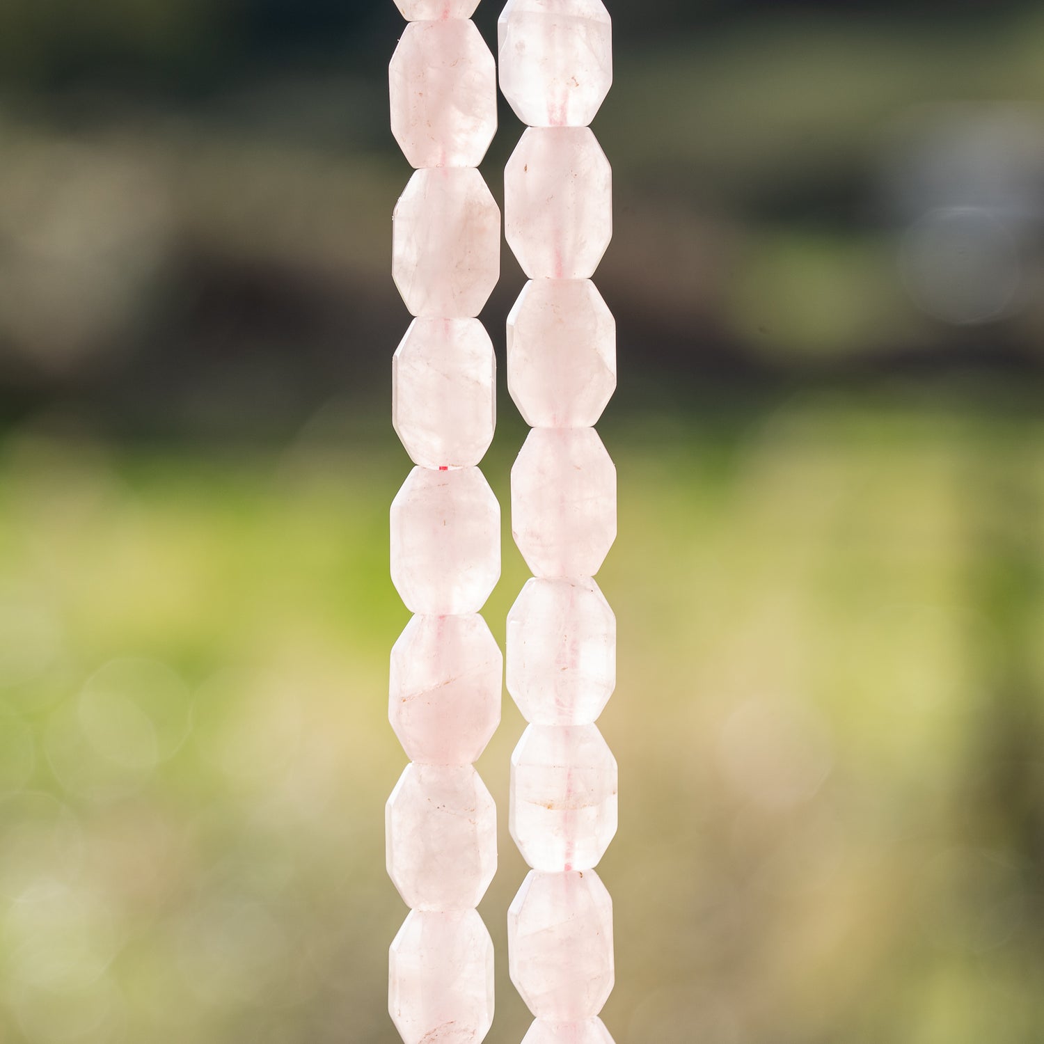 Perles ovales facettes de Quartz rose de 14 mm ( lot de 2 perles )