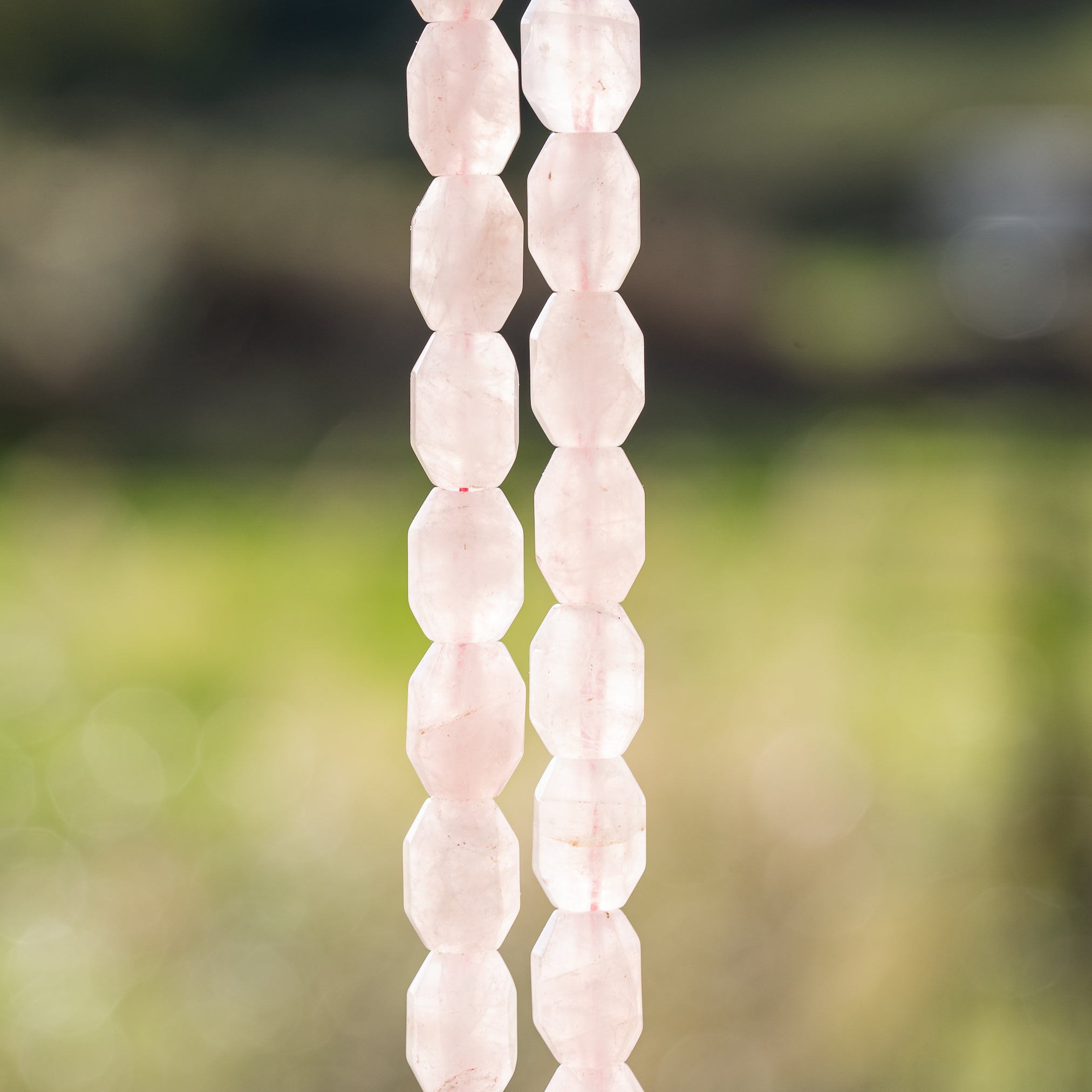 Perles ovales facettes de Quartz rose de 14 mm ( lot de 2 perles )