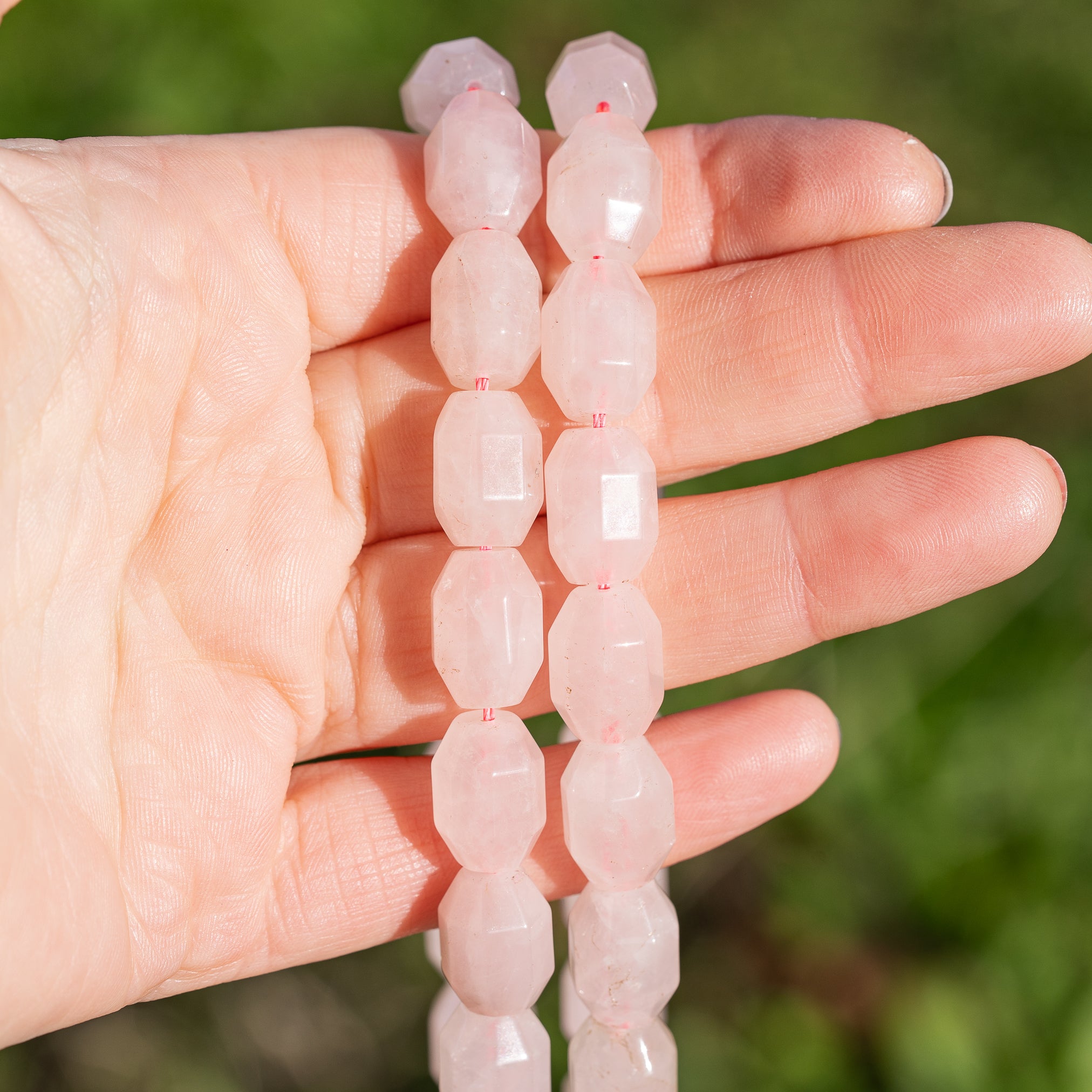 Perles ovales facettes de Quartz rose de 14 mm ( lot de 2 perles )