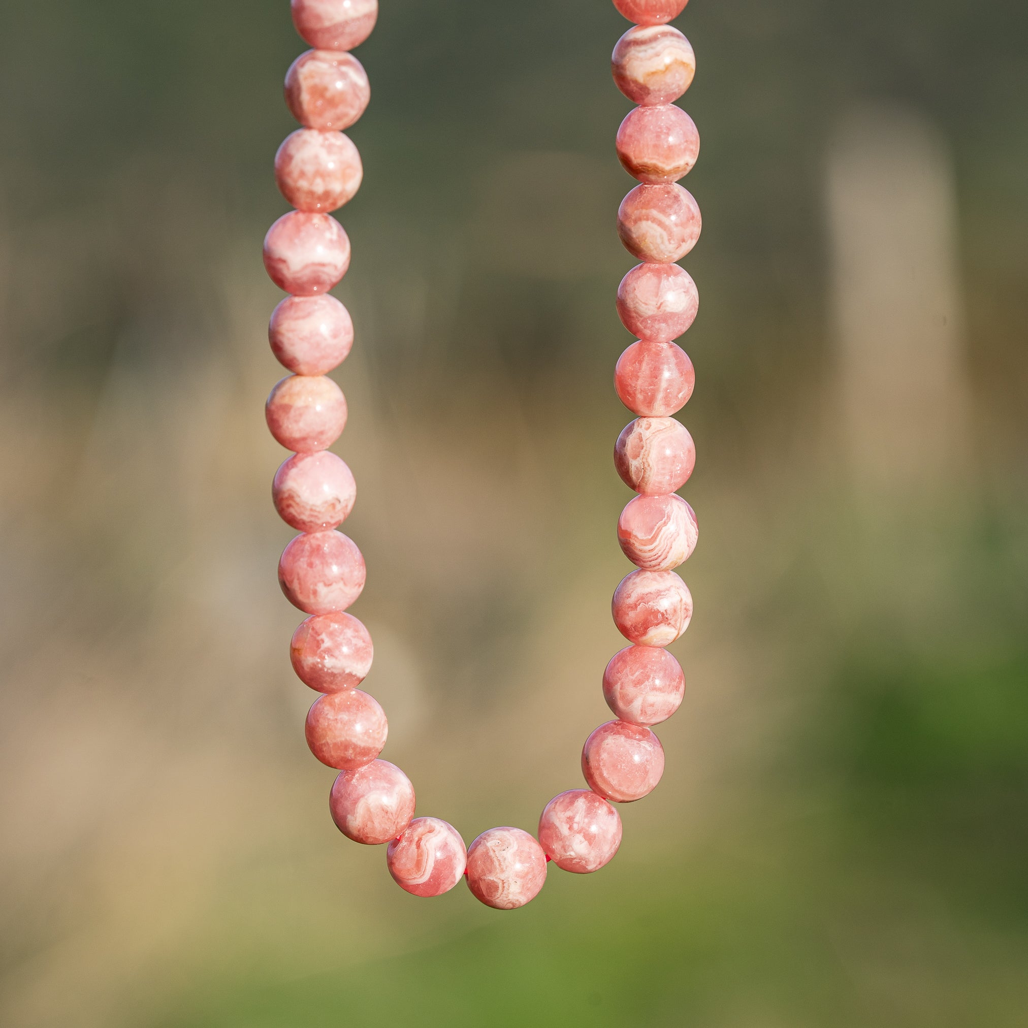 Perles rondes lisses de Rhodochrosite grade A de 7,8 mm ( à l&
