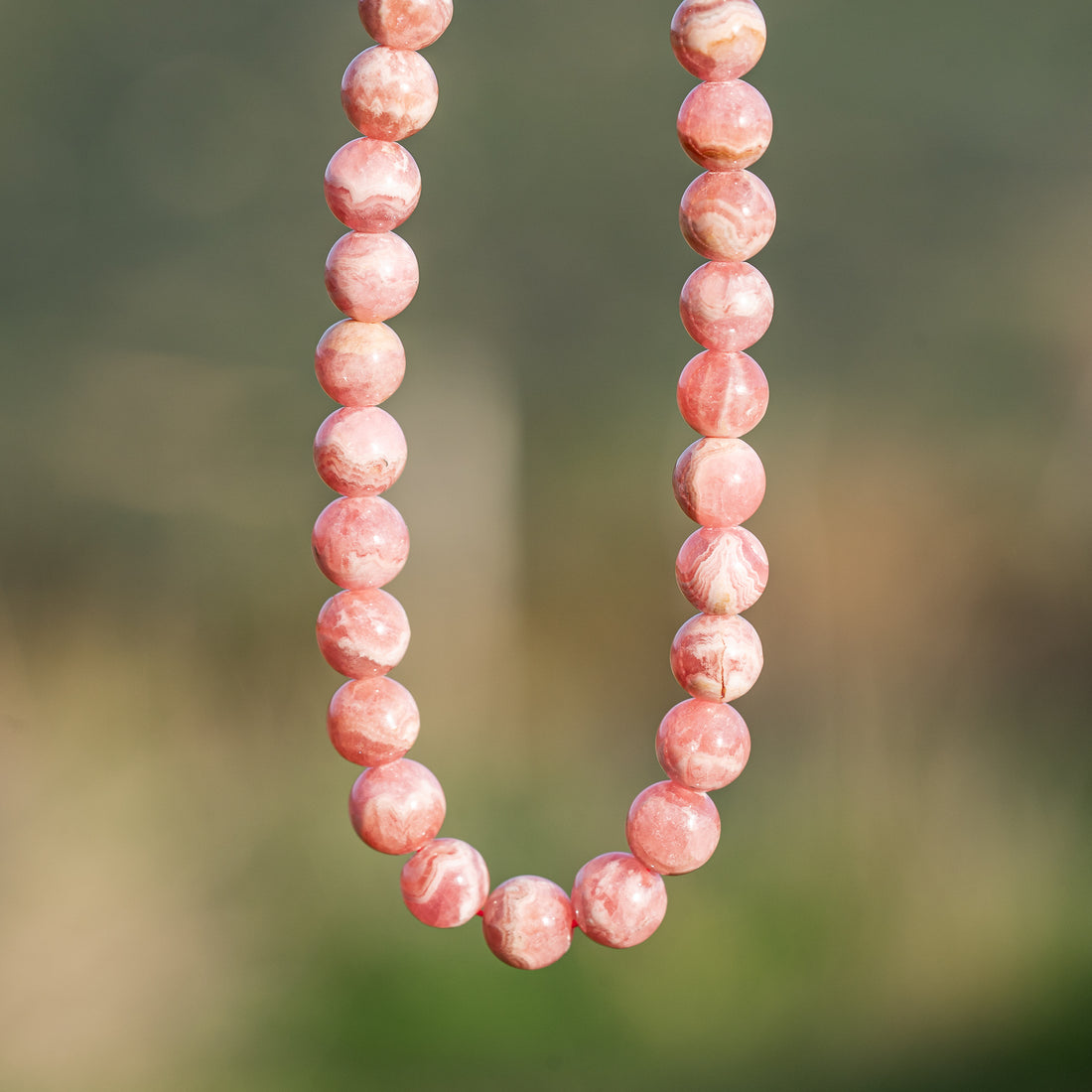 Perles rondes lisses de Rhodochrosite grade A de 7,8 mm ( à l&