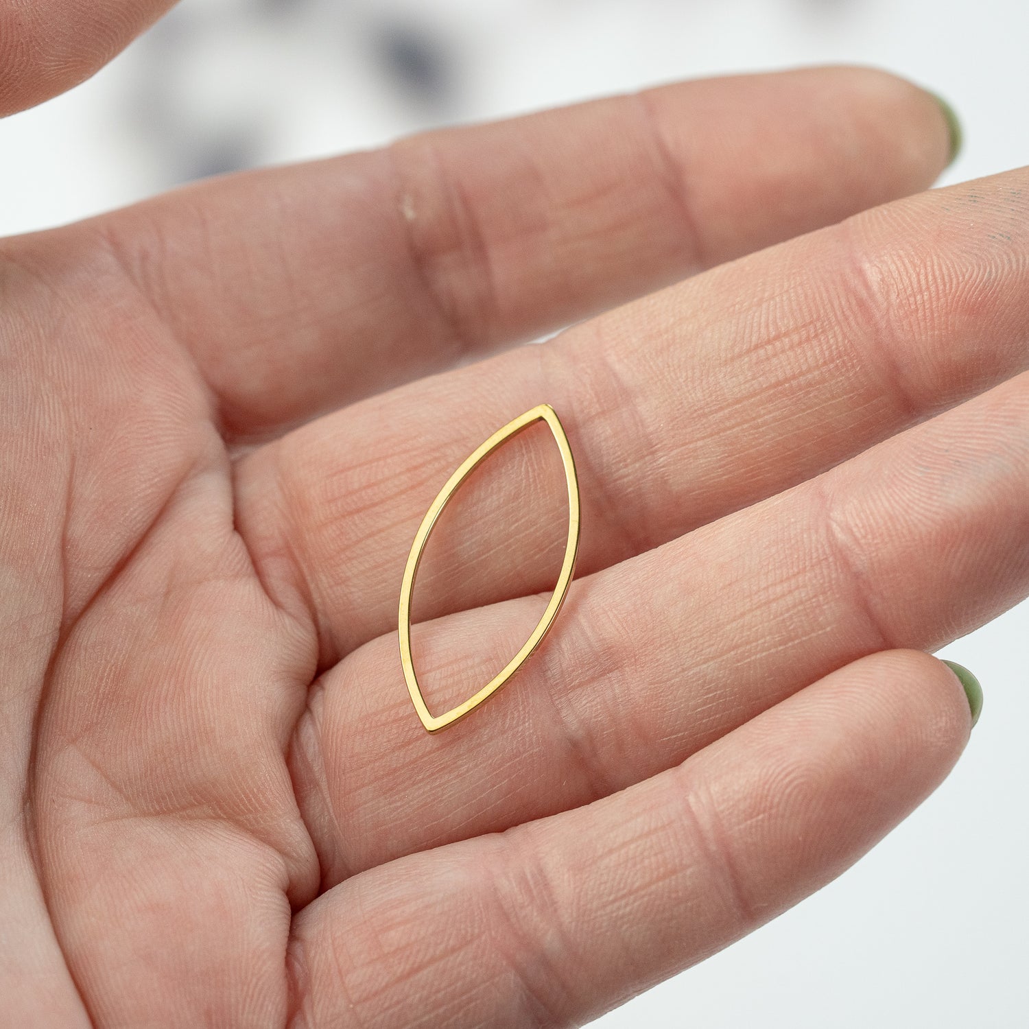 Anneaux fermés connecteurs ovoïdes acier inoxydable doré de 27 mm ( à l&
