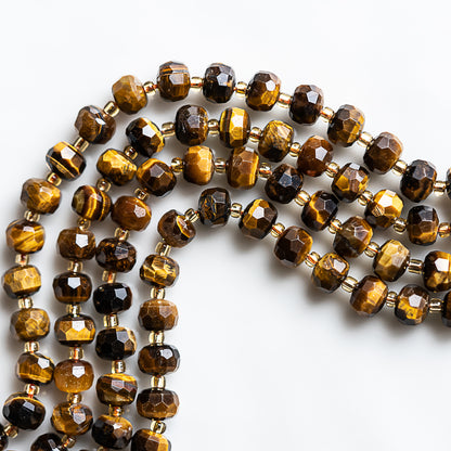 Perles rondelles facettes en Oeil de Tigre de 7/8 x 5,5/6 mm ( rang de env 45 perles )