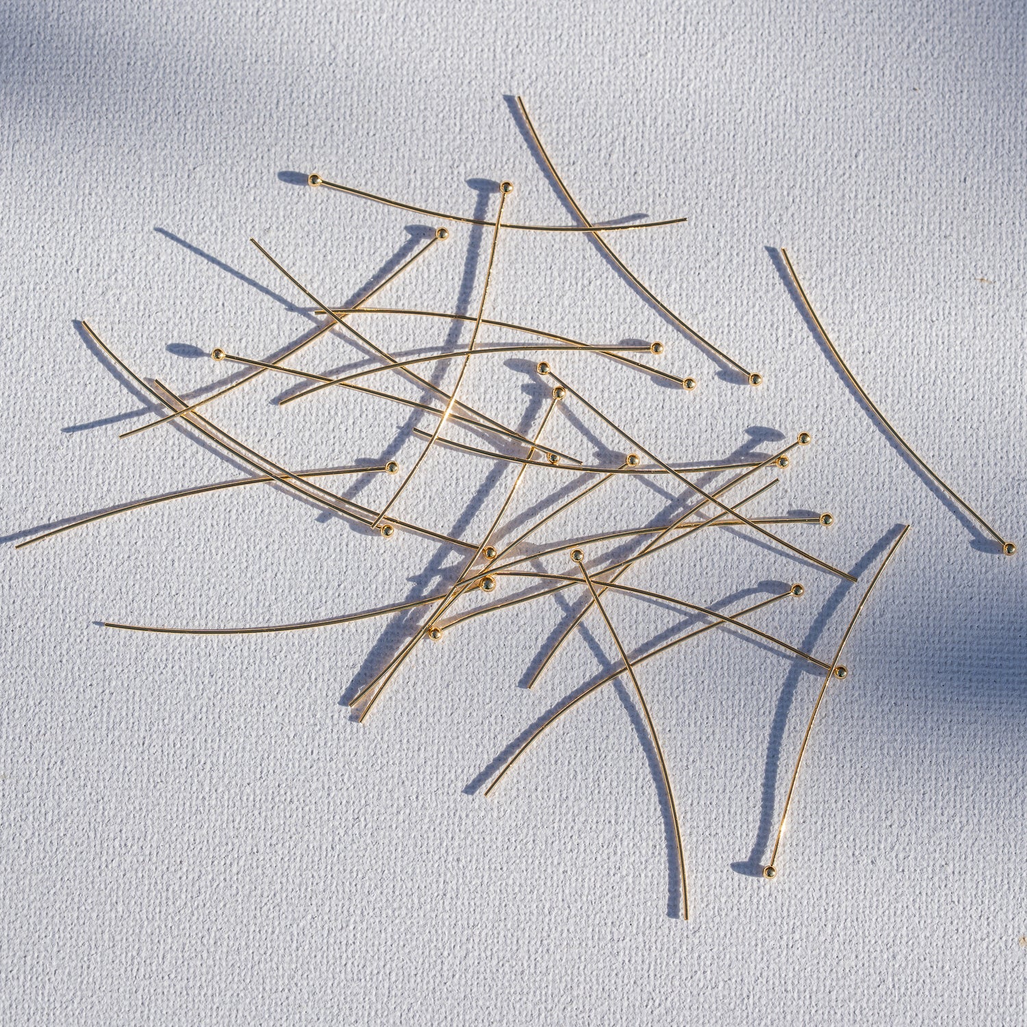 Clous têtes boule en laiton plaqué or 18k de 50 x 0,5 mm ( lot de 10 )