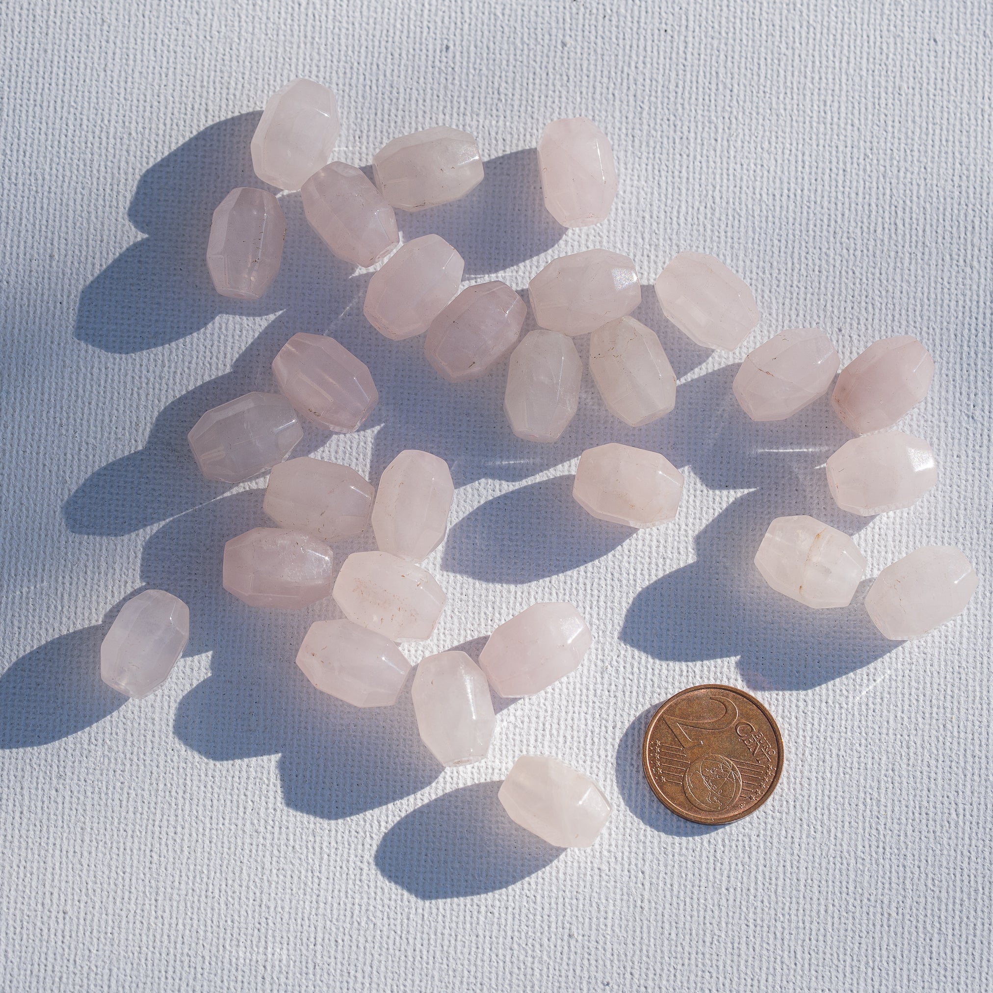 Perles ovales facettes de Quartz rose de 14 mm ( lot de 2 perles )