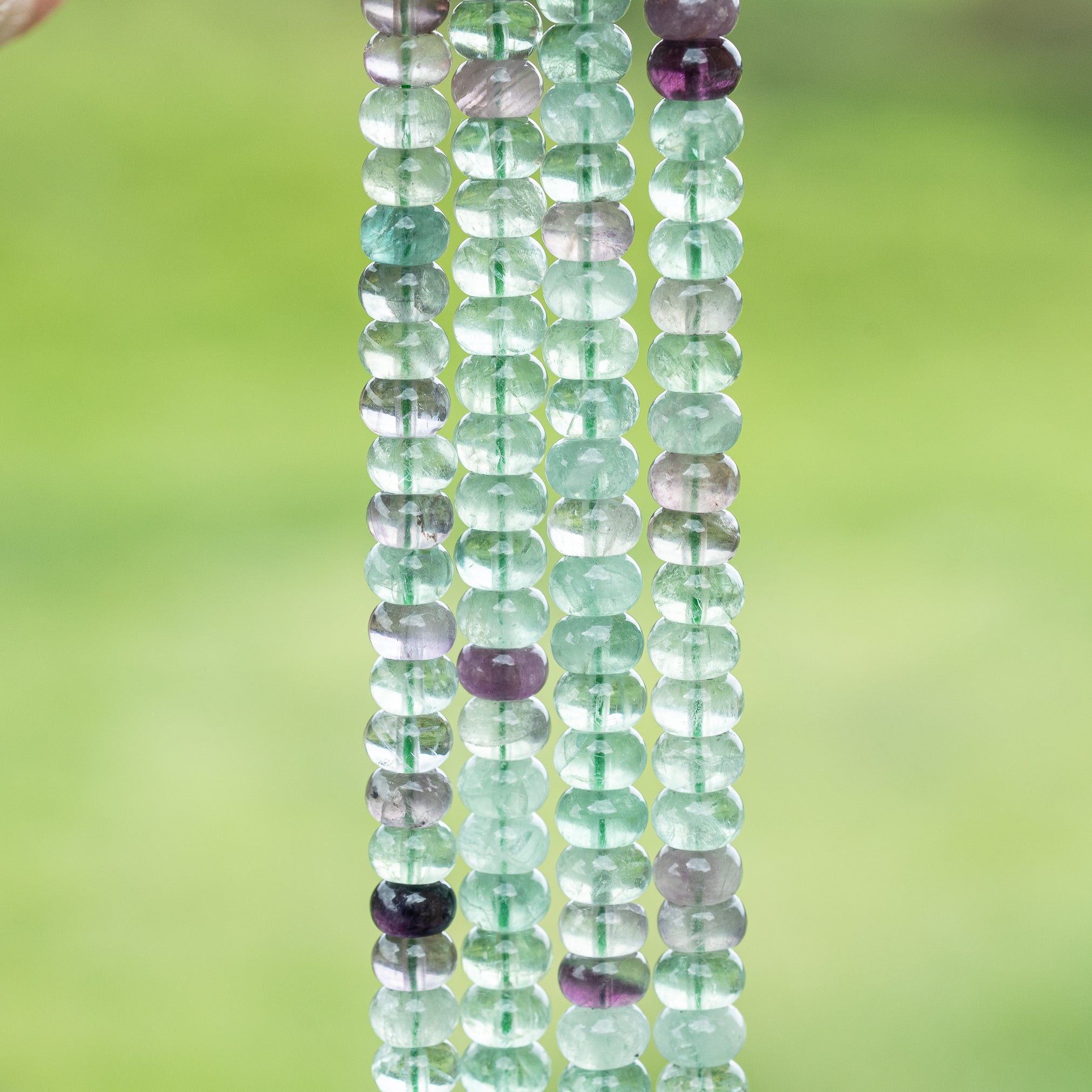 Perles rondelles lisses de Fluorite multicolore de 8 x 5 mm ( 1/2 rang de env 36 perles )