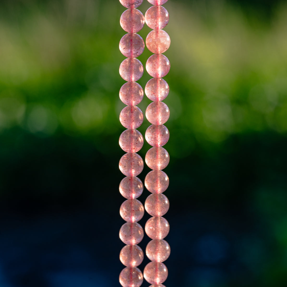 Perles rondes lisses de Quartz fraise de 8,5 mm ( 1/2 rang de env 23 perles )