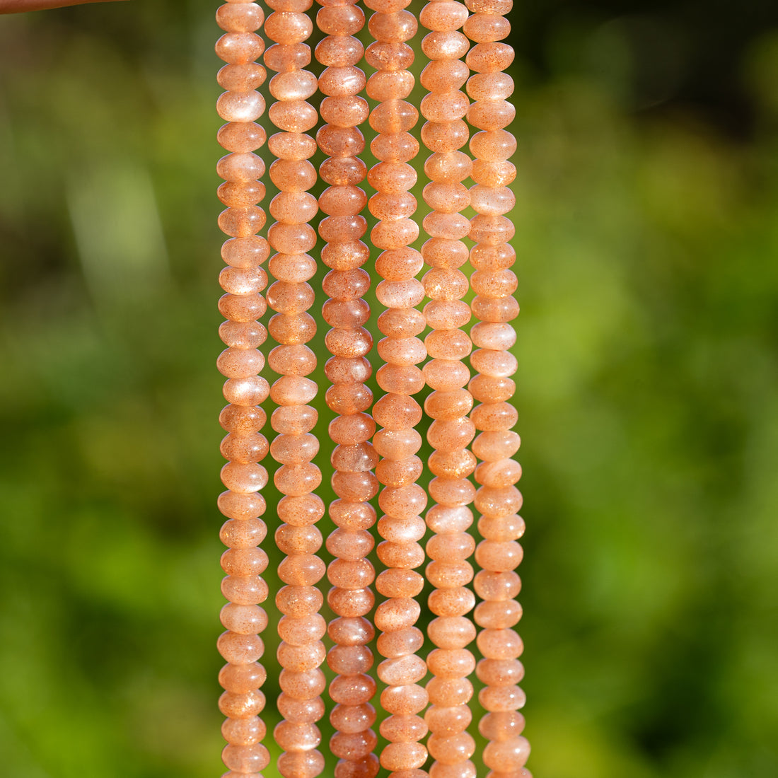 Perles rondelles lisses en Pierre de soleil extra ✨ de 5 x 3 mm ( 1/2 rang de env 64 perles )