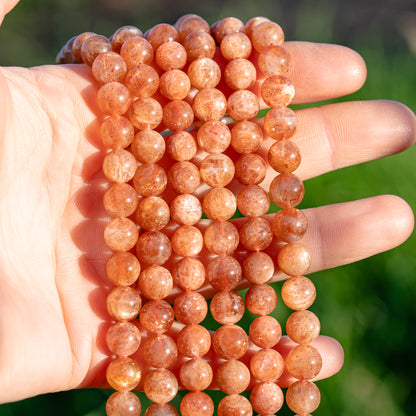 Perles rondes lisses de Pierre de soleil grade A de 8 ou 8,5 mm ( lot de 10 perle ou par 1/2 rang )