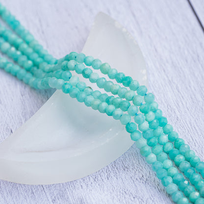 Perles rondelles facettes en Amazonite de 3,8 x 2,8 mm ( rang de env 134 perles )